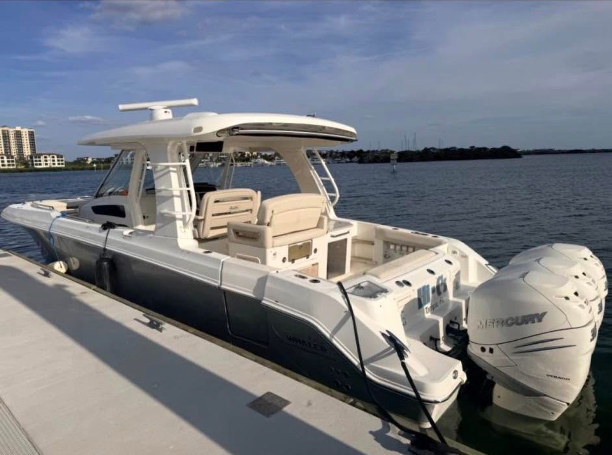 2019 Boston Whaler 350 Realm boat docked.