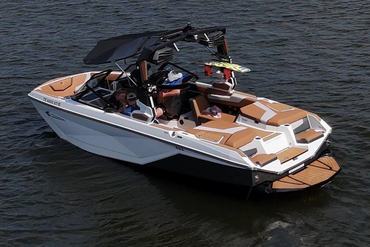 2023 Nautique Super Air Nautique G23 boat on water, featuring sleek design and modern amenities.