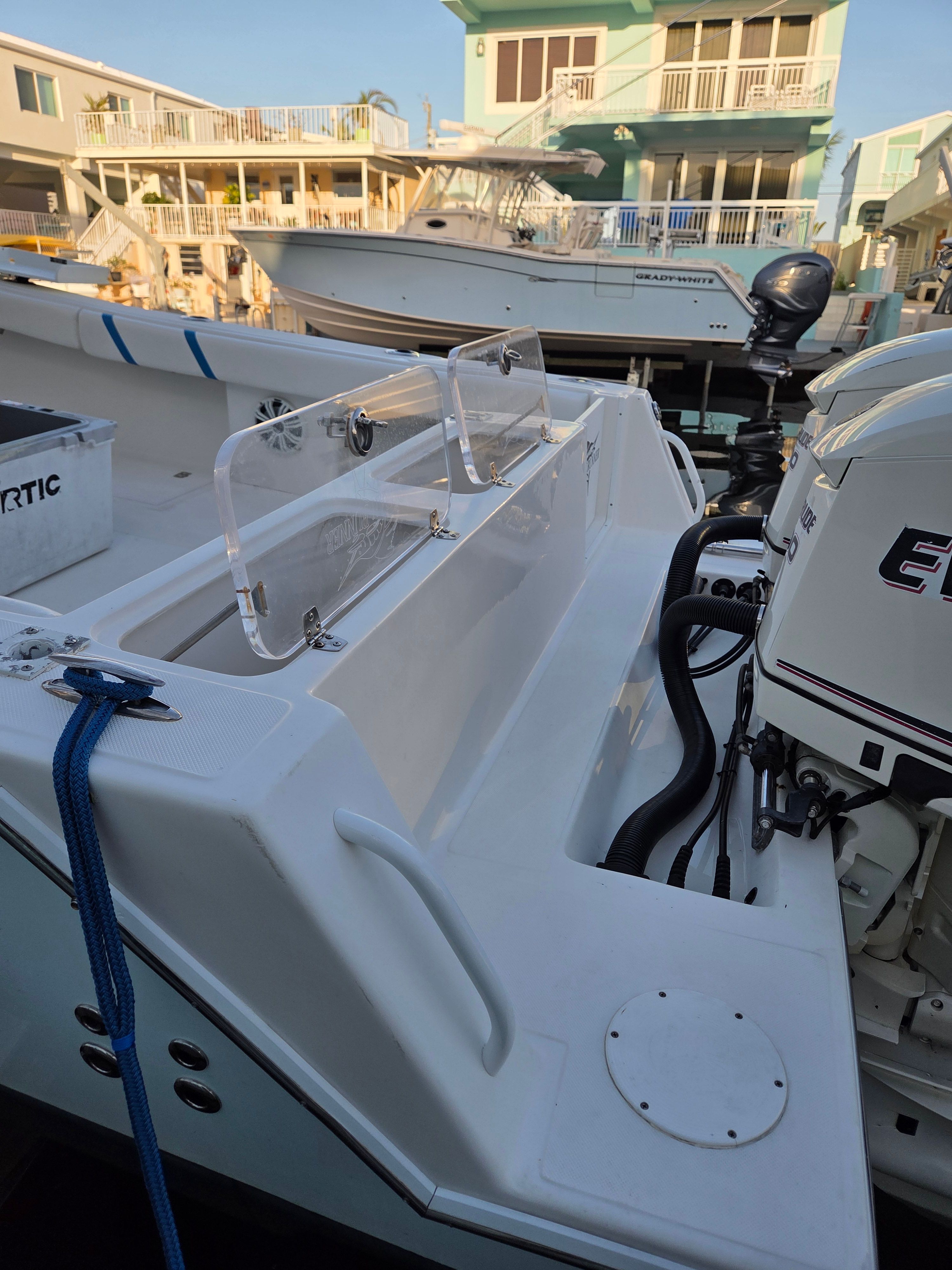 2012 Ocean Runner 29 boat docked at marina.