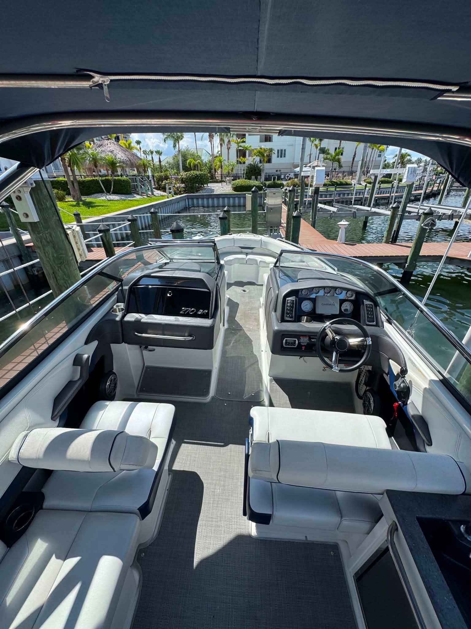 Interior view of a 2018 Formula 270 Bowrider boat at dock.