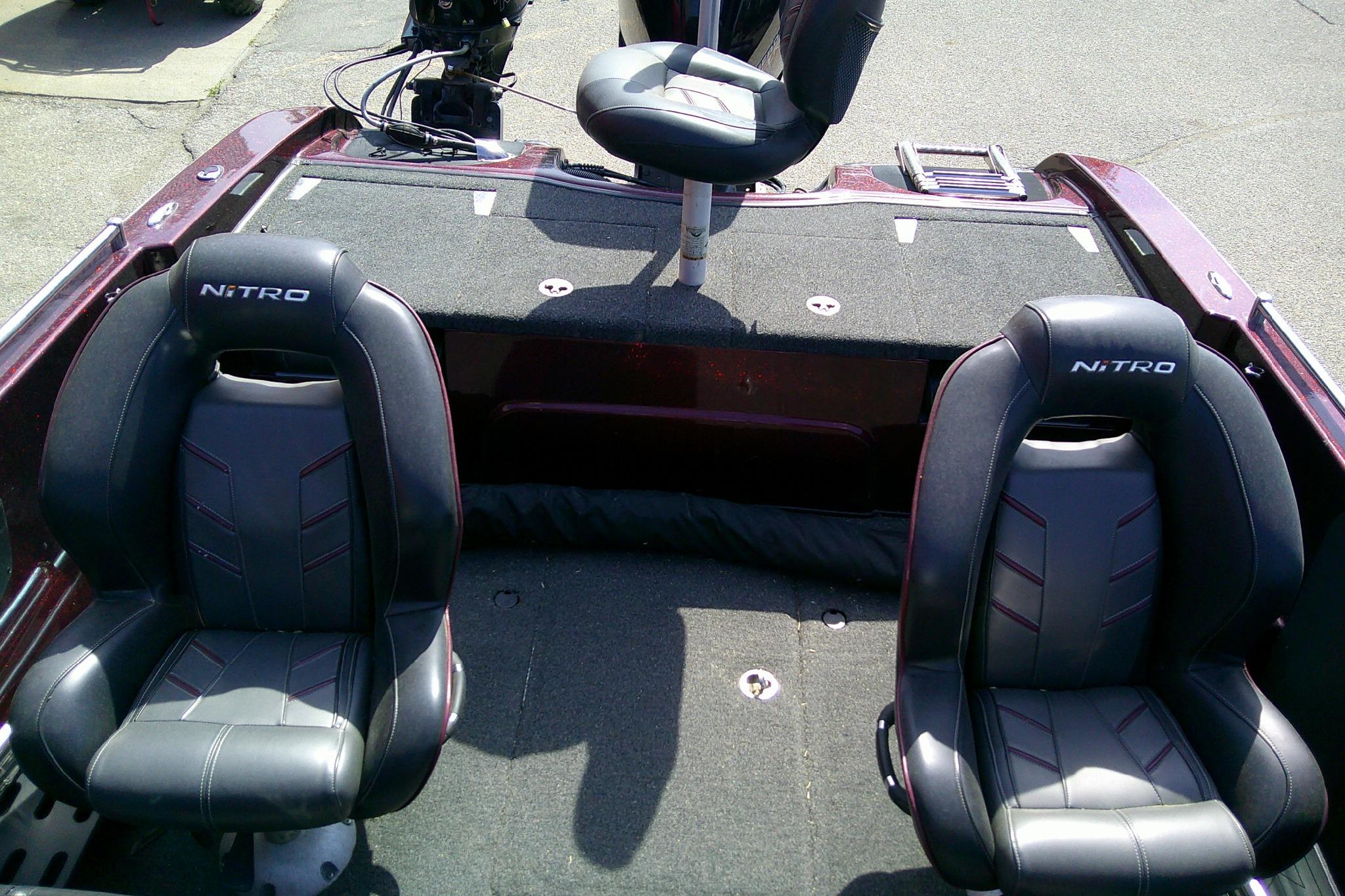 2019 Nitro ZV19 Sport boat interior with black seats and fishing deck.