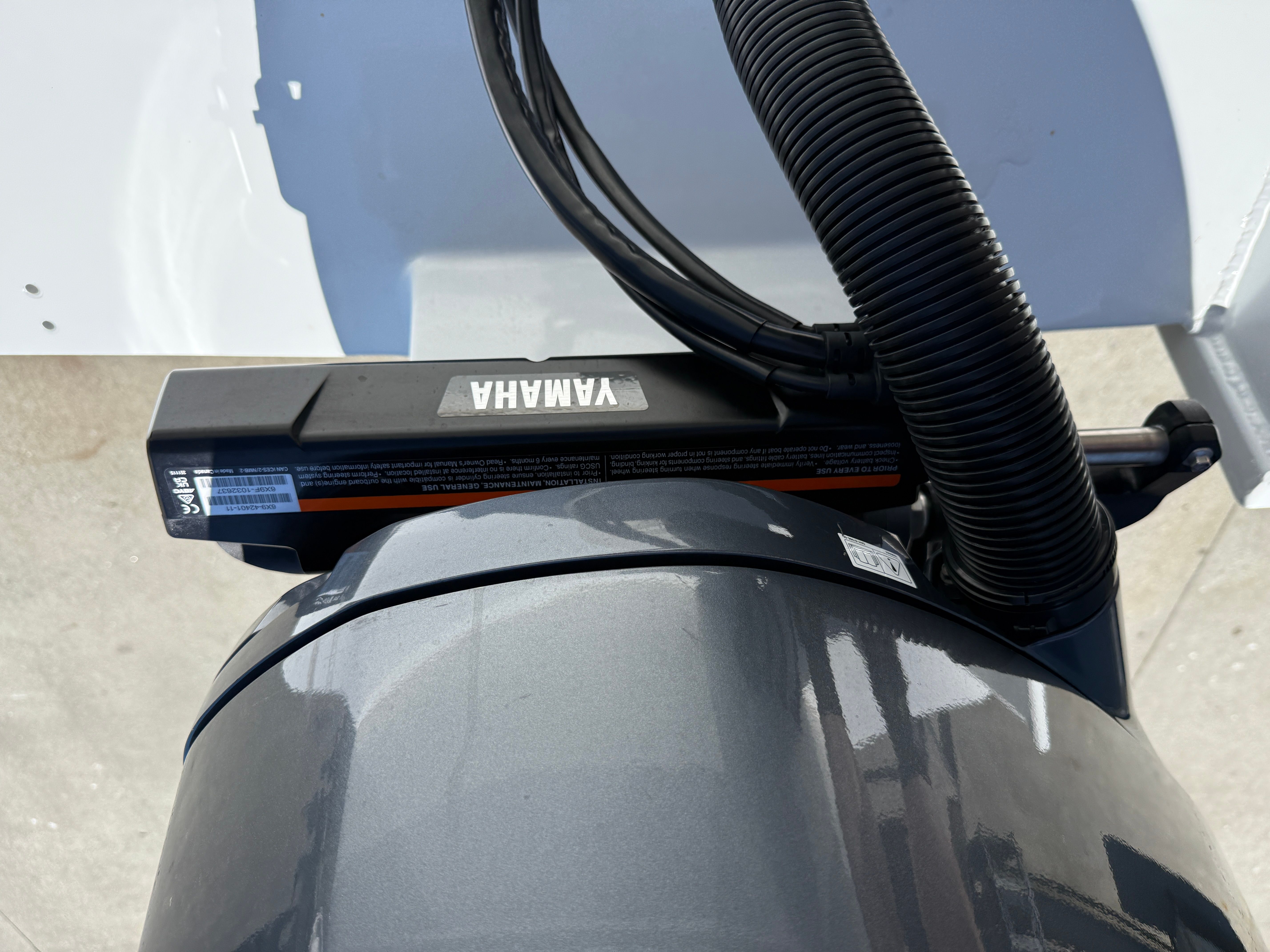 Close-up of a Yamaha outboard motor on a boat.