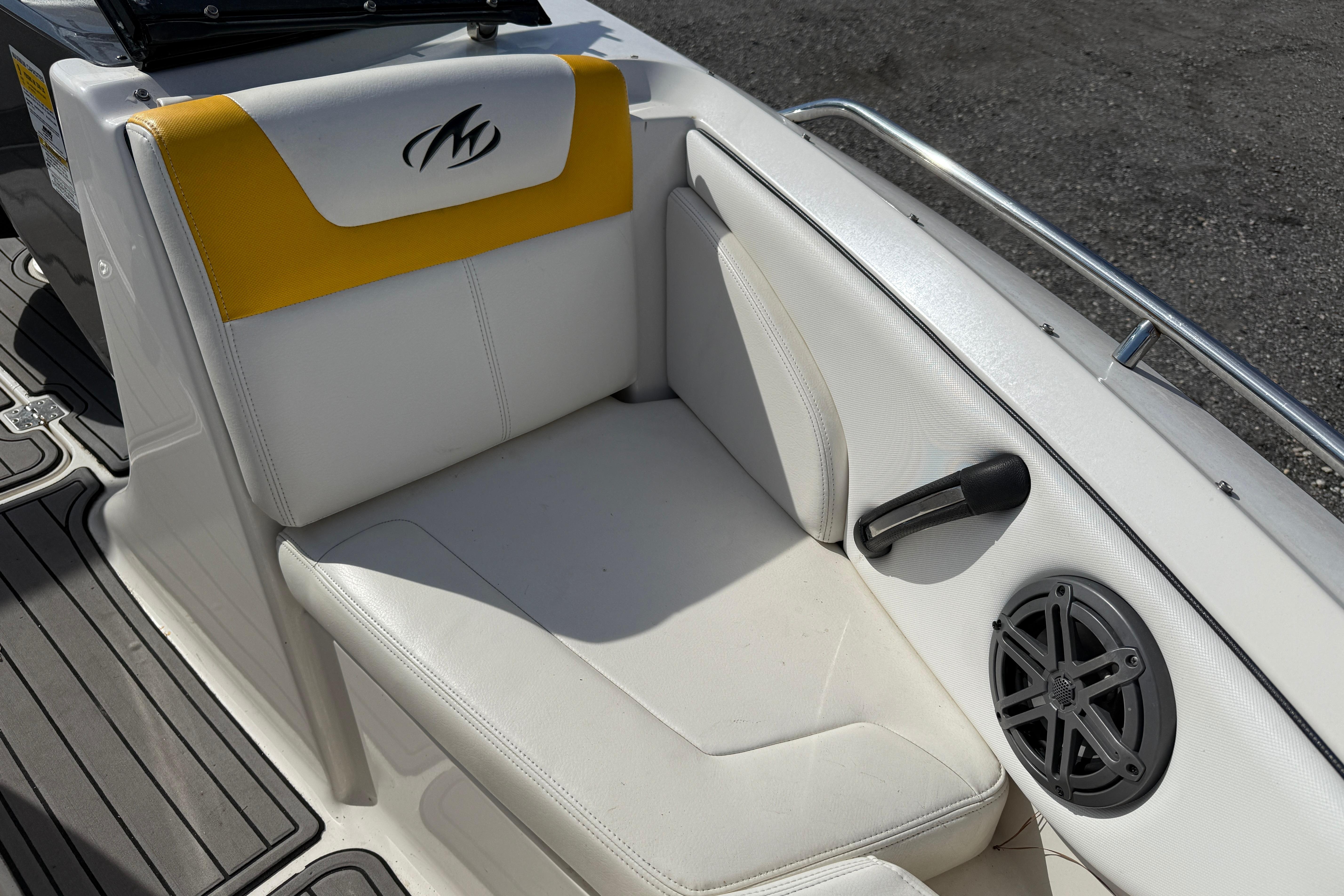 2014 Monterey 197 Blackfin boat seat with yellow accent and speaker.