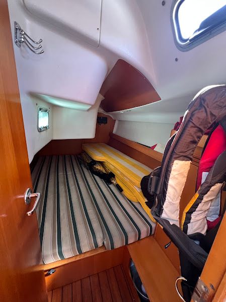 Interior of a 2000 Beneteau First 40.7 yacht with sleeping area.