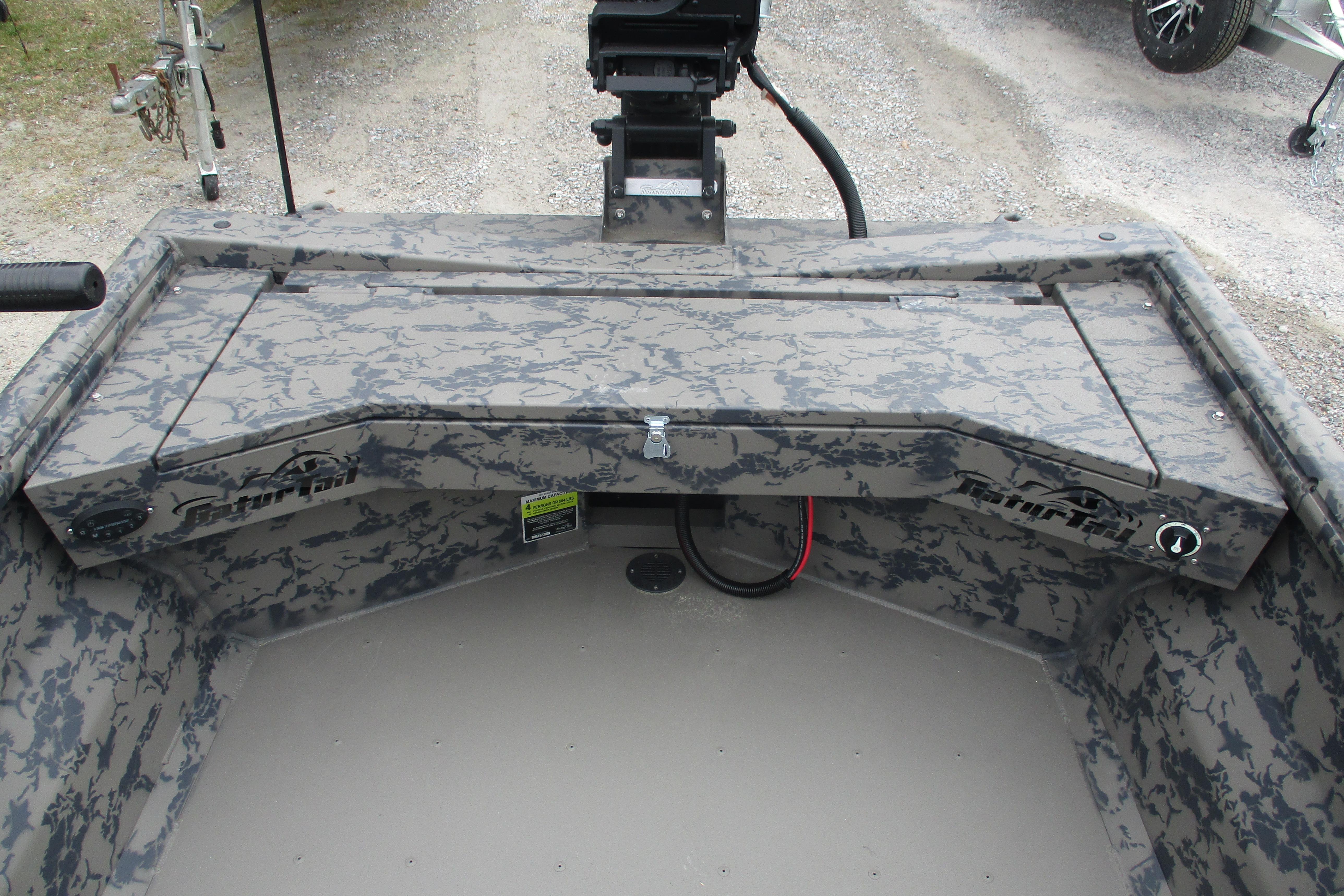 2026 Gator Tail 1754 Extreme boat interior with camo design and storage compartments.
