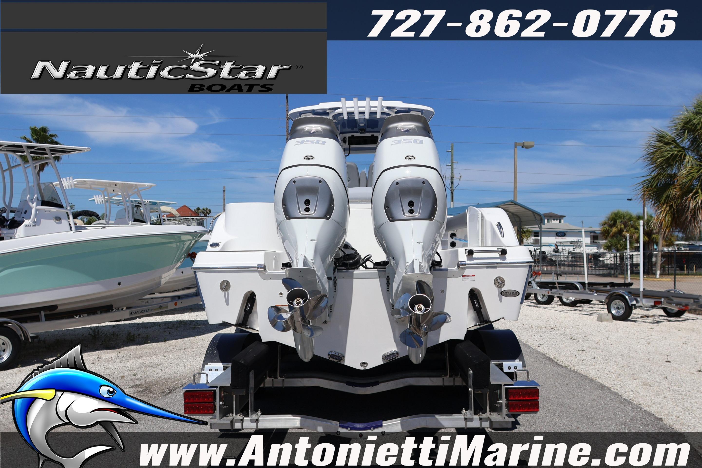 2026 NauticStar 292 Legacy boat with dual engines on display at Antonietti Marine.
