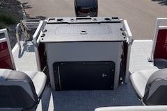 2026 Sun Tracker SportFish 22 DLX boat interior with seating and storage.