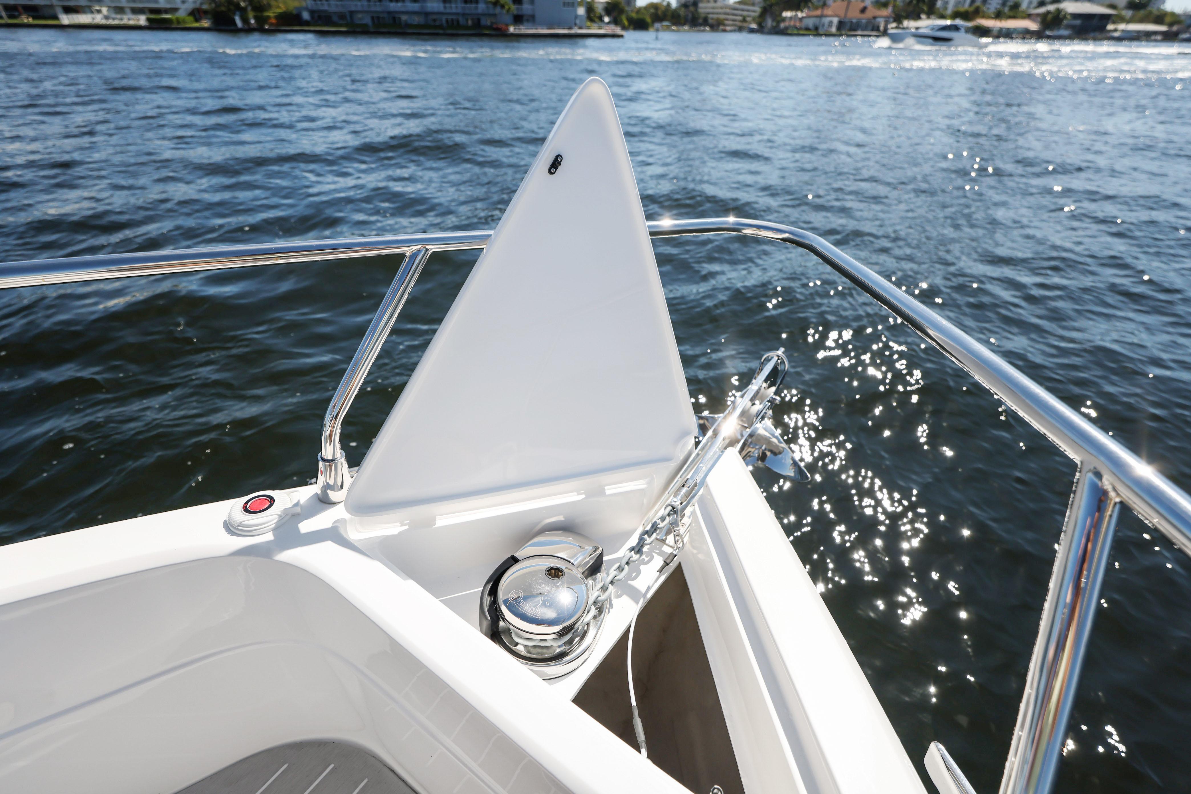 2025 Valiatt 380 Bowrider boat bow with anchor, on sparkling water.
