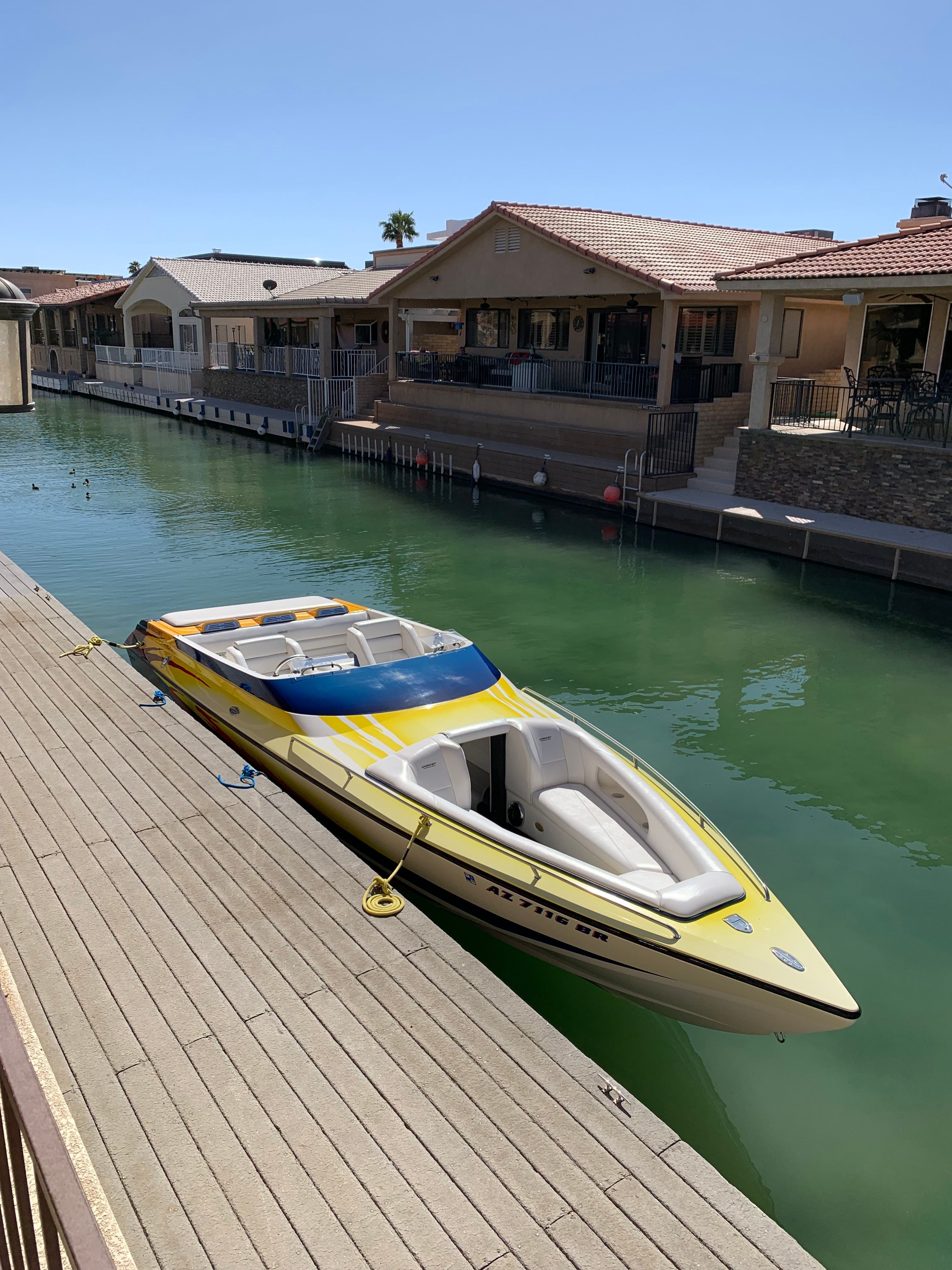 Lavey Craft 2750 NUERA boat docked, 2002 model.
