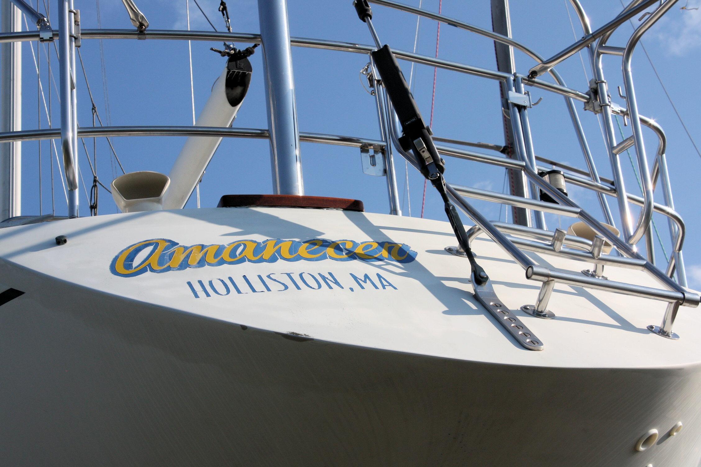 Sailboat stern with "Amanecer" name, Ericson 38-200, 1987, Holliston, MA.