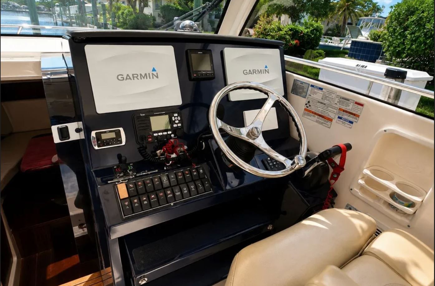 Helm of 2016 Pursuit OS 325 Offshore with Garmin navigation.
