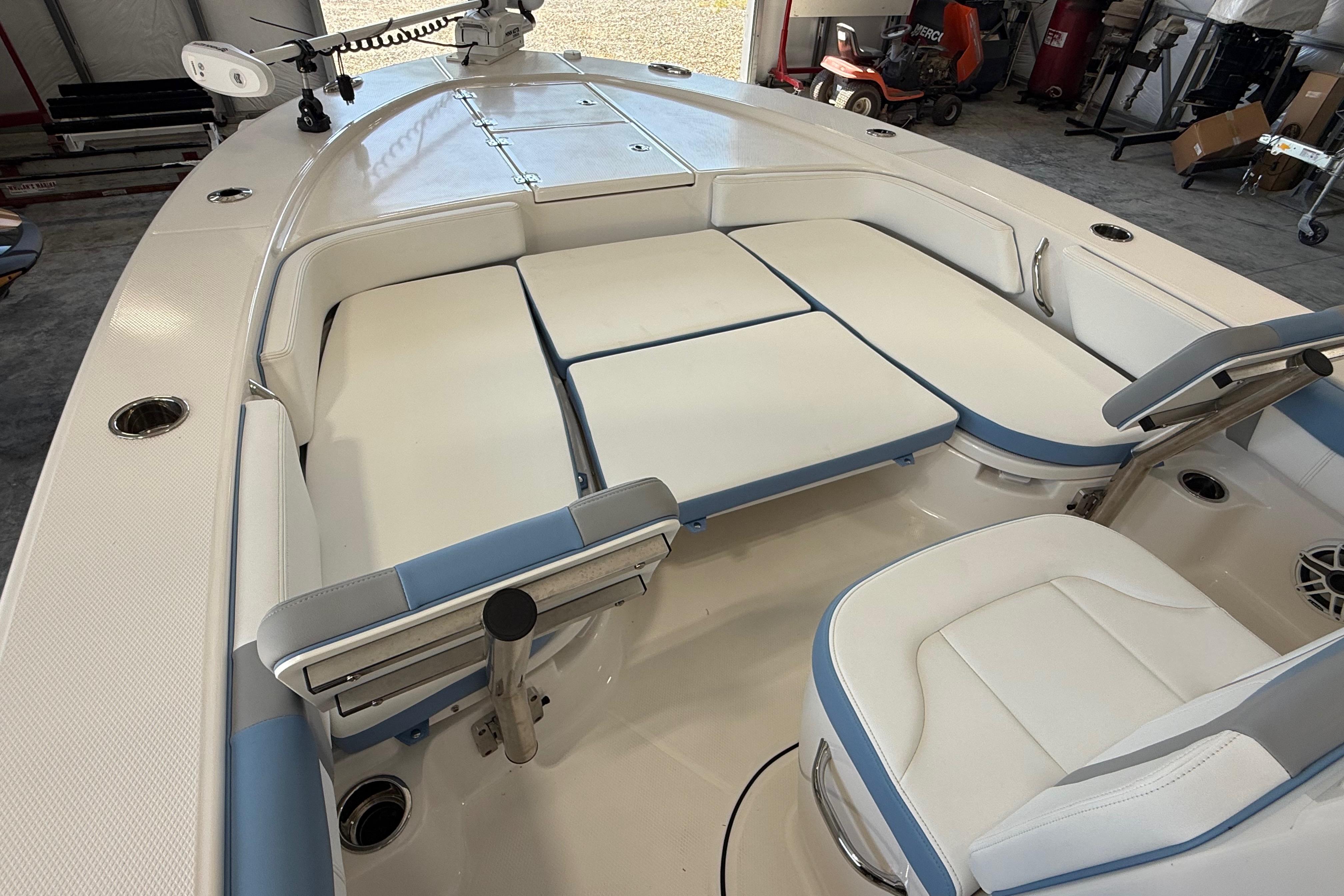 2026 Robalo 246 Cayman boat interior with cushioned seating and modern design.