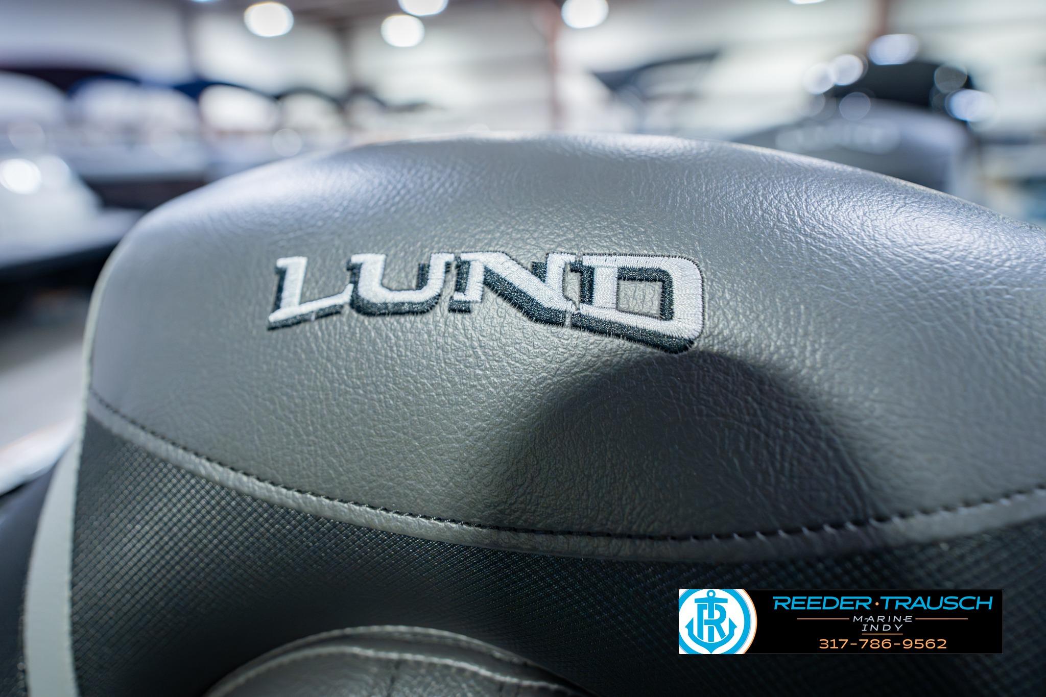 Close-up of Lund 1775 Impact XS boat seat with logo, 2026 model.