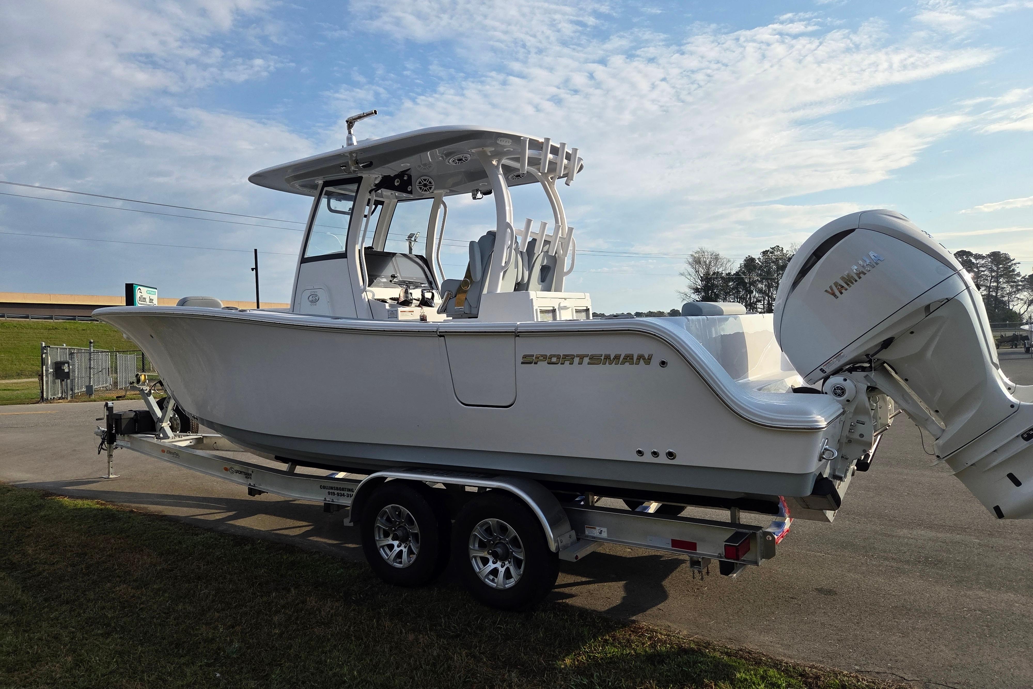 2026 Sportsman Open 282 Center Console boat on trailer, featuring Yamaha outboard motor.