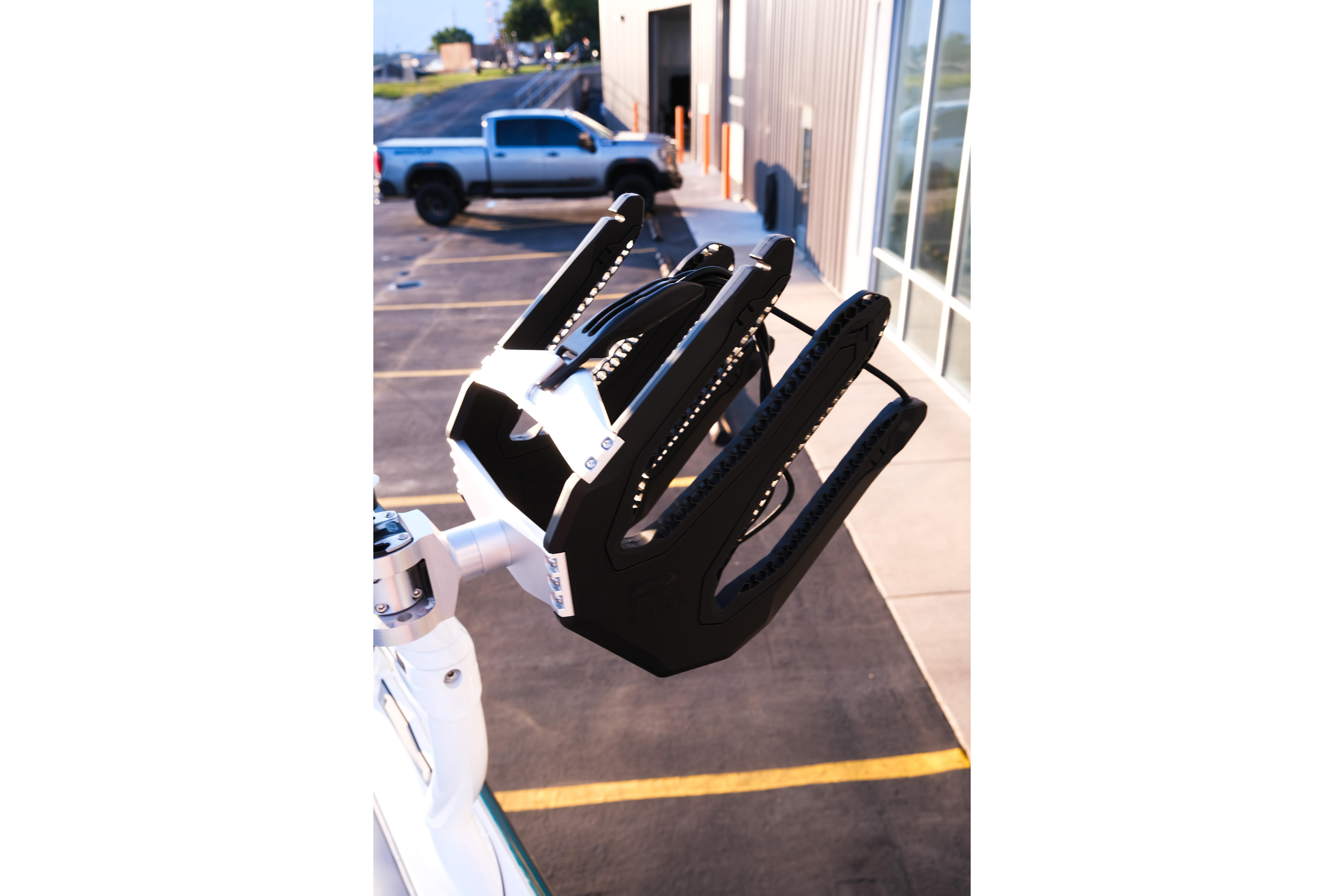 Moomba Max 2026 boat accessory detail in a parking lot setting.