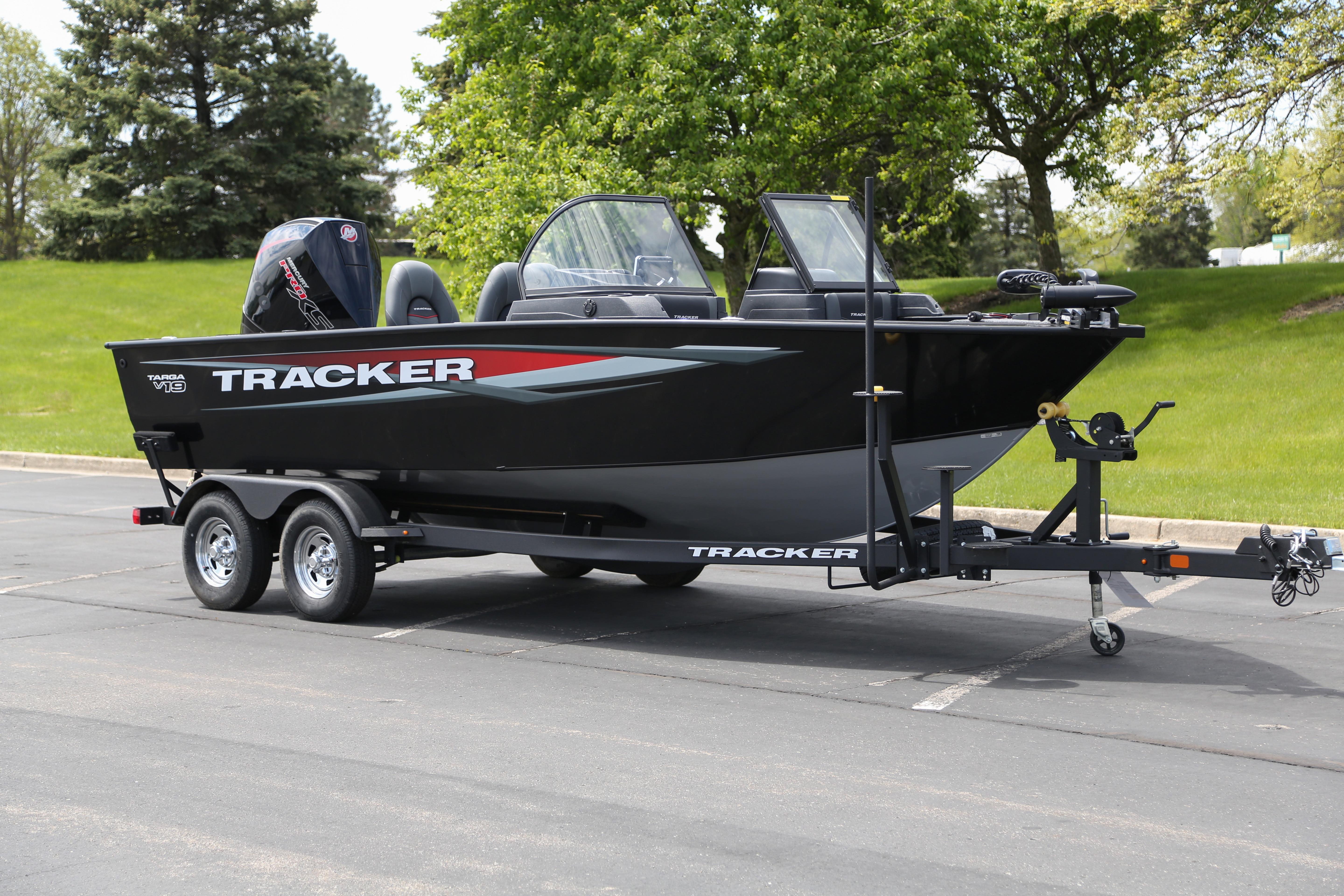 2026 Tracker Targa V-19 WT boat on trailer in parking lot.