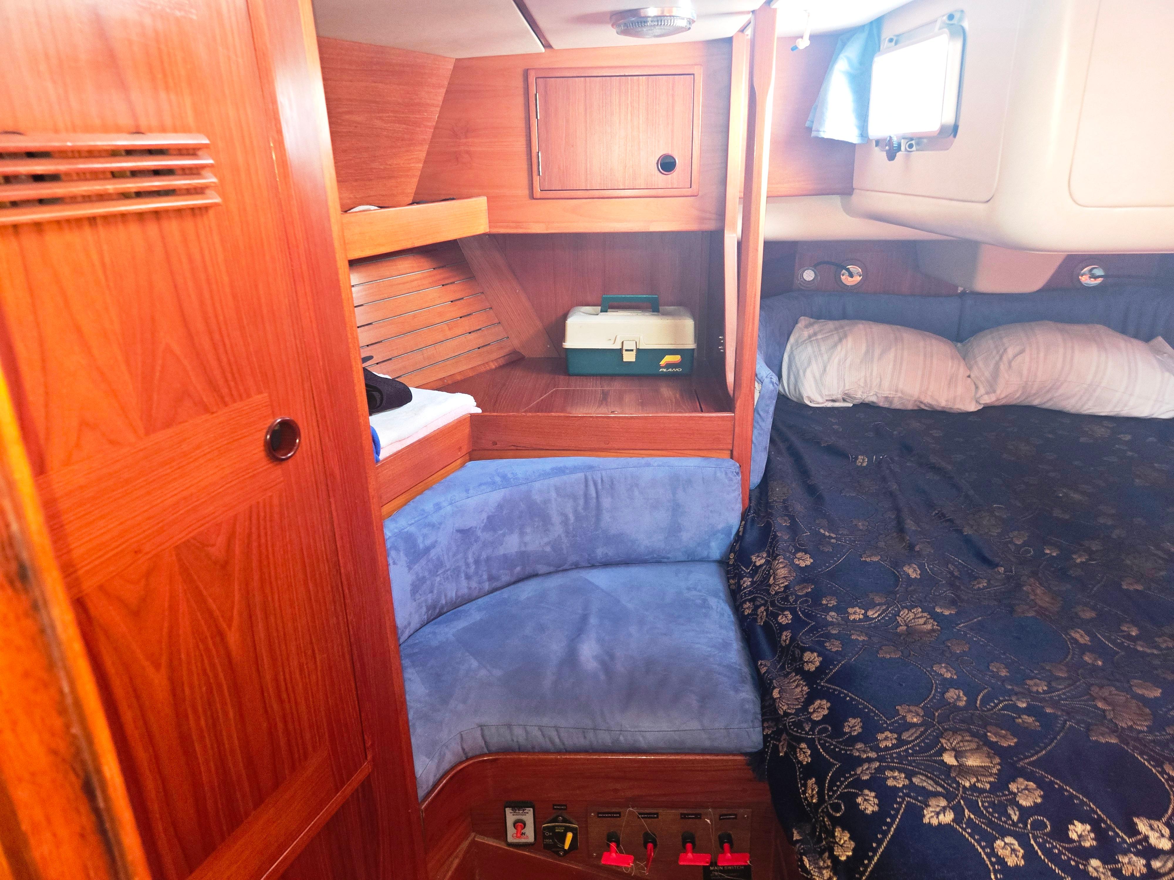 Interior of a 1982 Baltic 42 yacht with wooden furnishings.