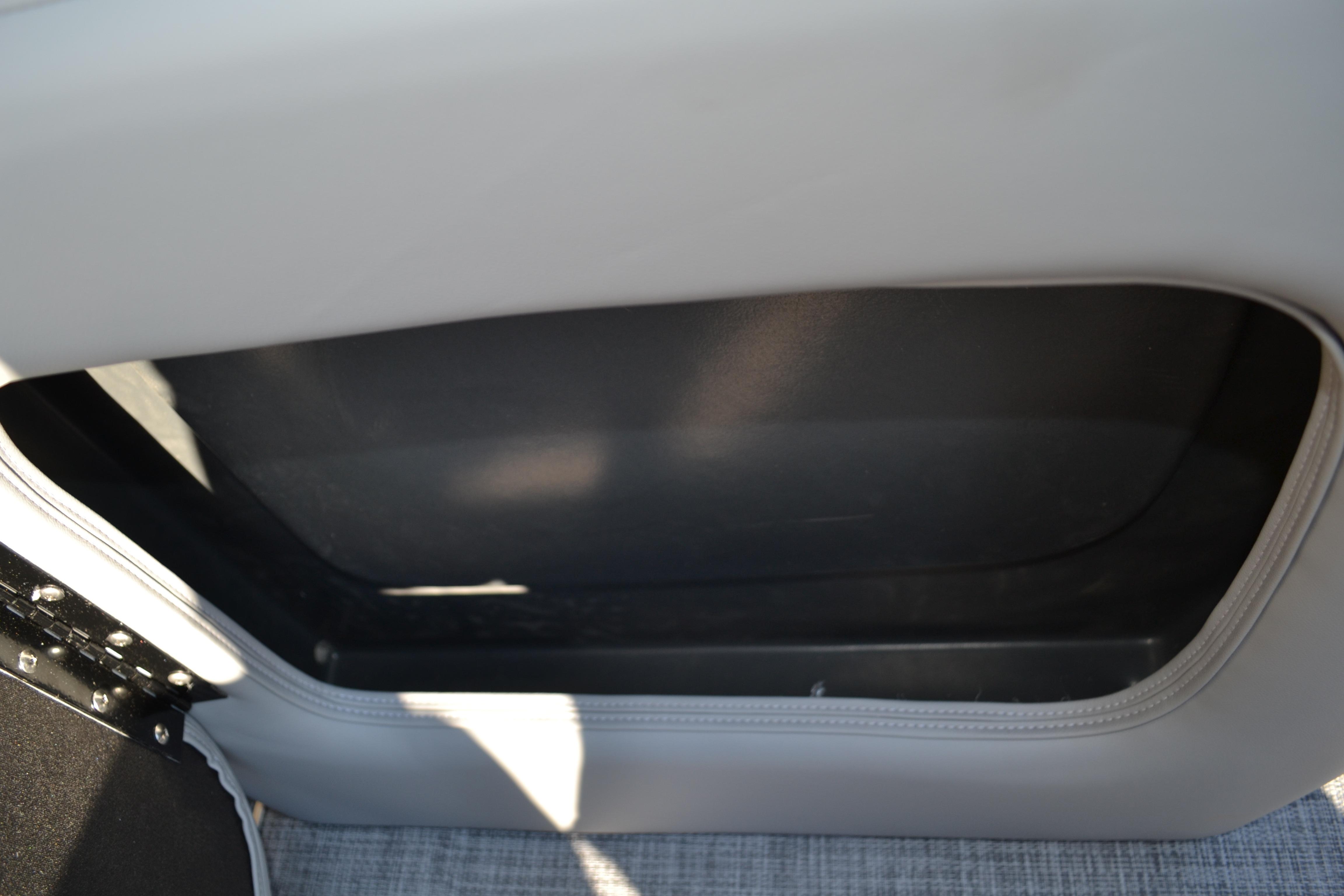 Storage compartment in 2026 Sun Tracker SportFish 22 XP3 boat interior.