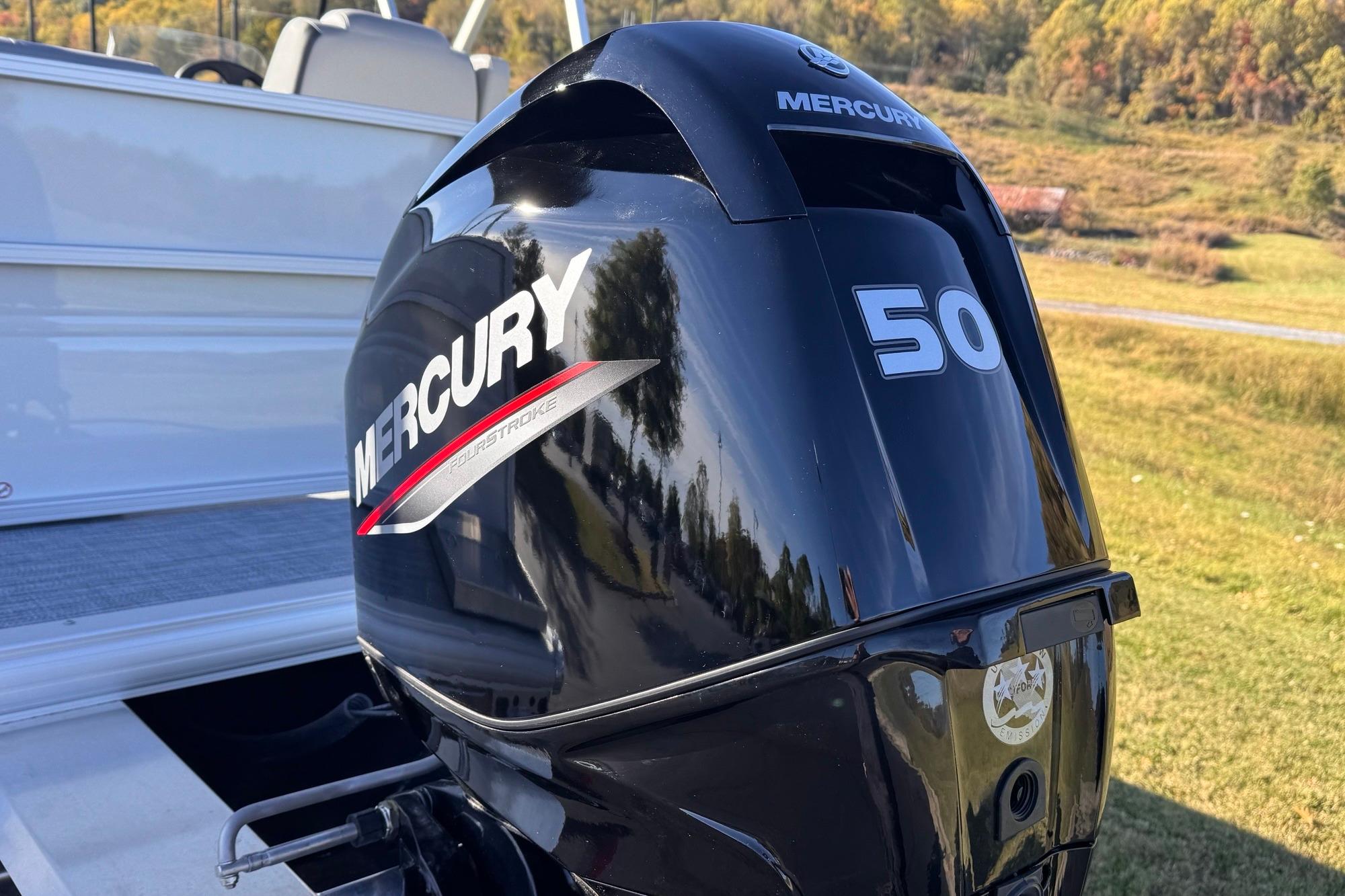 Mercury 50 horsepower outboard motor on 2026 Sun Tracker Party Barge 16 DLX.