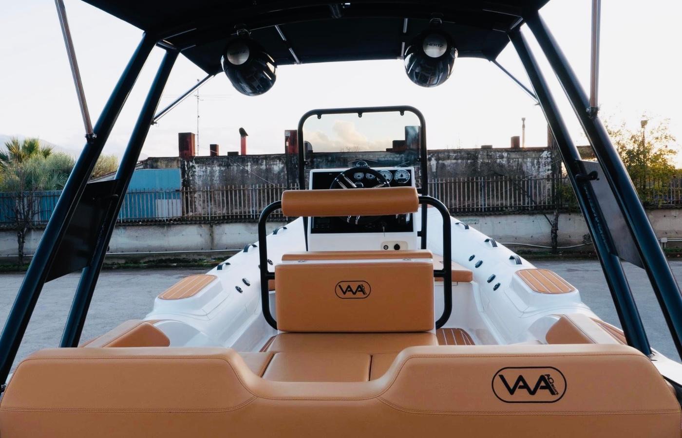 2025 Aqvaboats Luxrib 22, luxury boat interior with tan seating and modern controls.