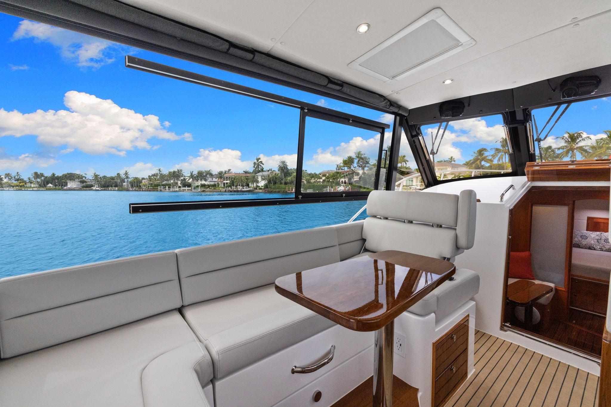 Luxurious interior of 2024 MJM 42 yacht with scenic ocean view.