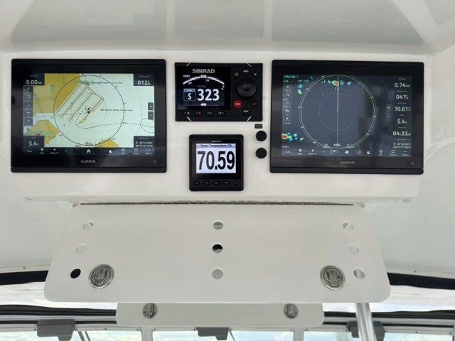 Navigation systems and screens on a boat.