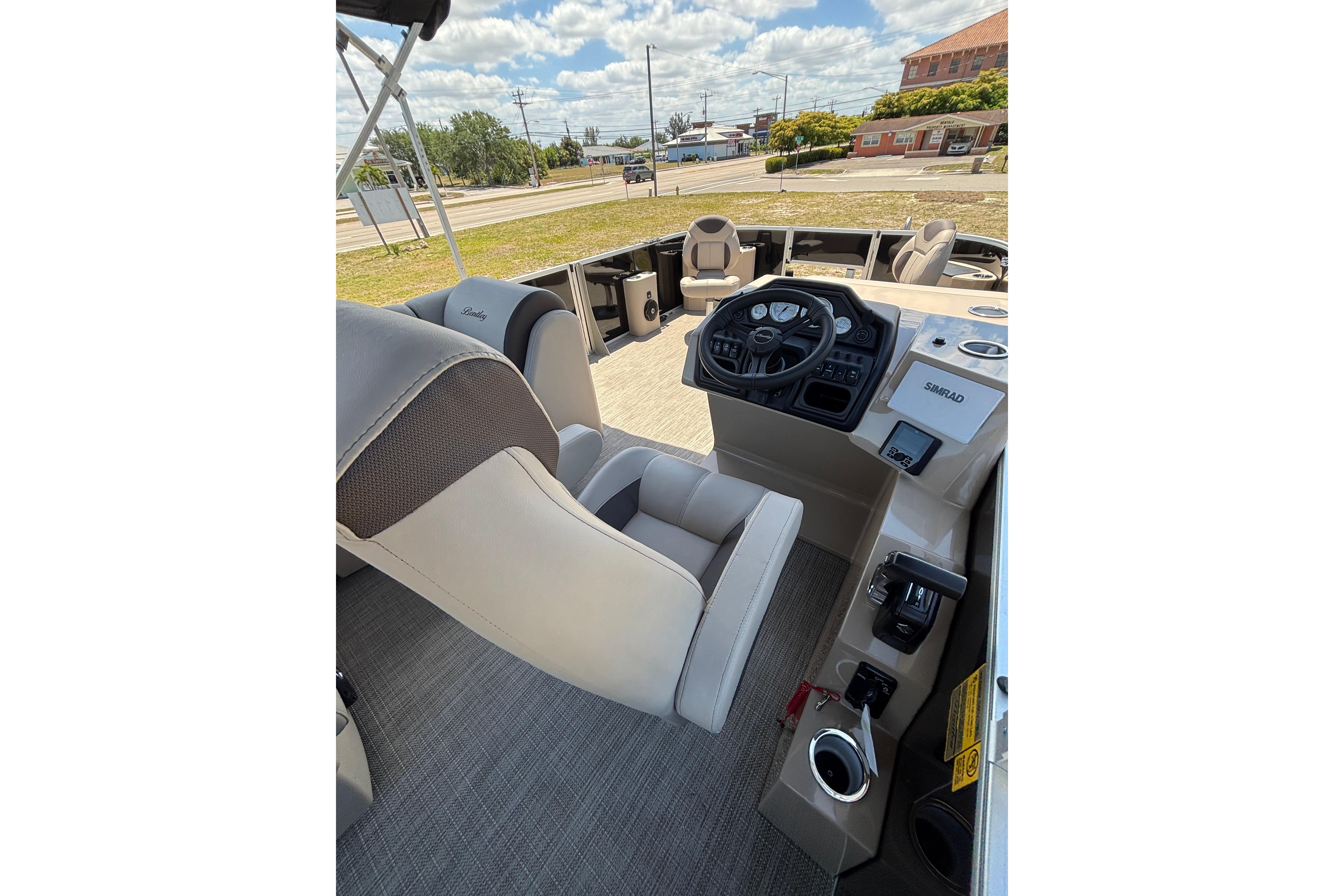 Interior of 2026 Bentley Pontoons Fish 243 4-Point with helm console.