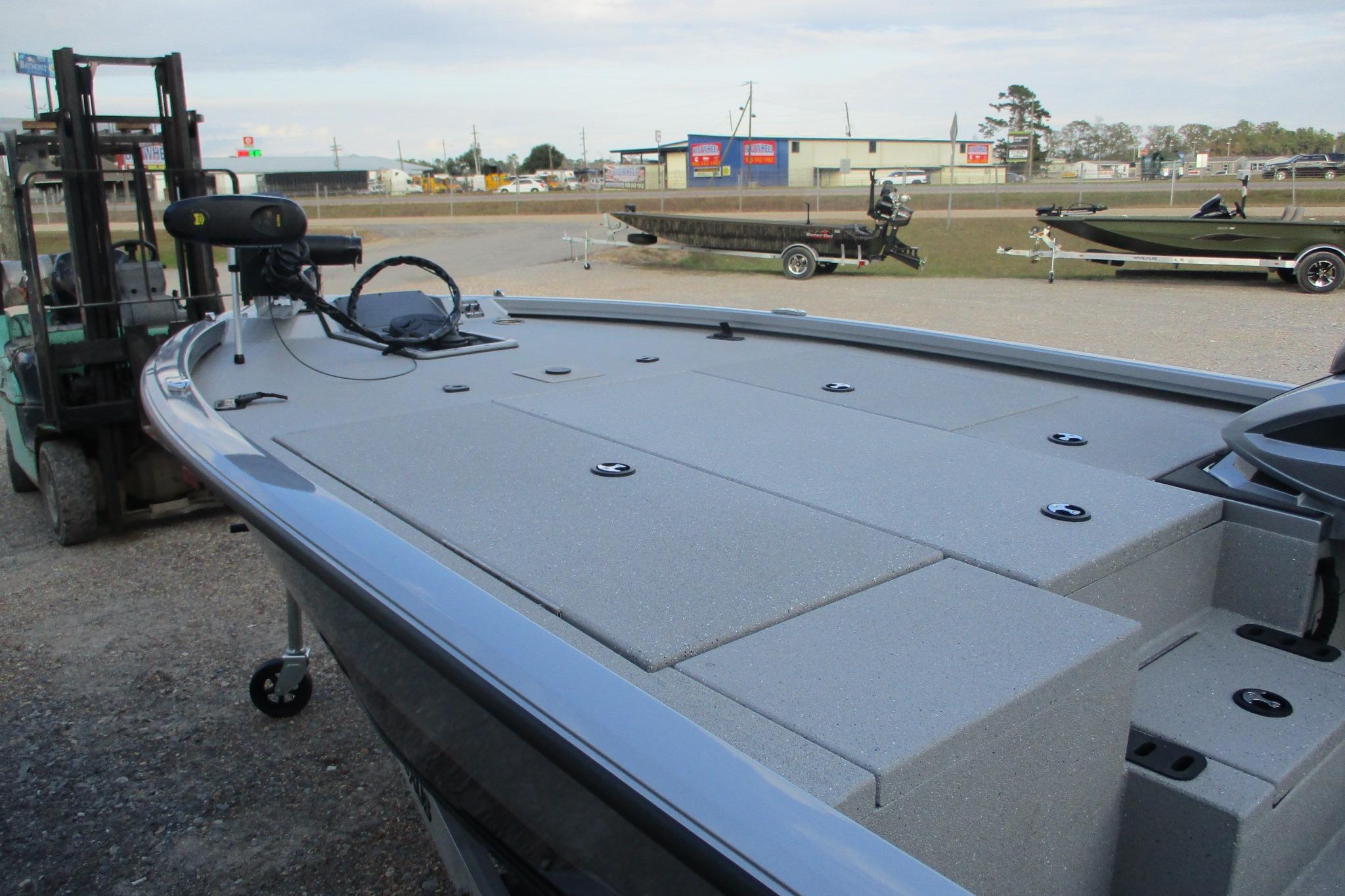 2026 Vexus AVX2080 boat on display, featuring a spacious deck and modern design.