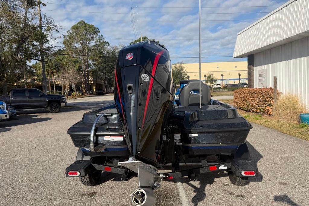 2026 Nitro Z19 XL Pro boat on trailer, rear view, parked outdoors.
