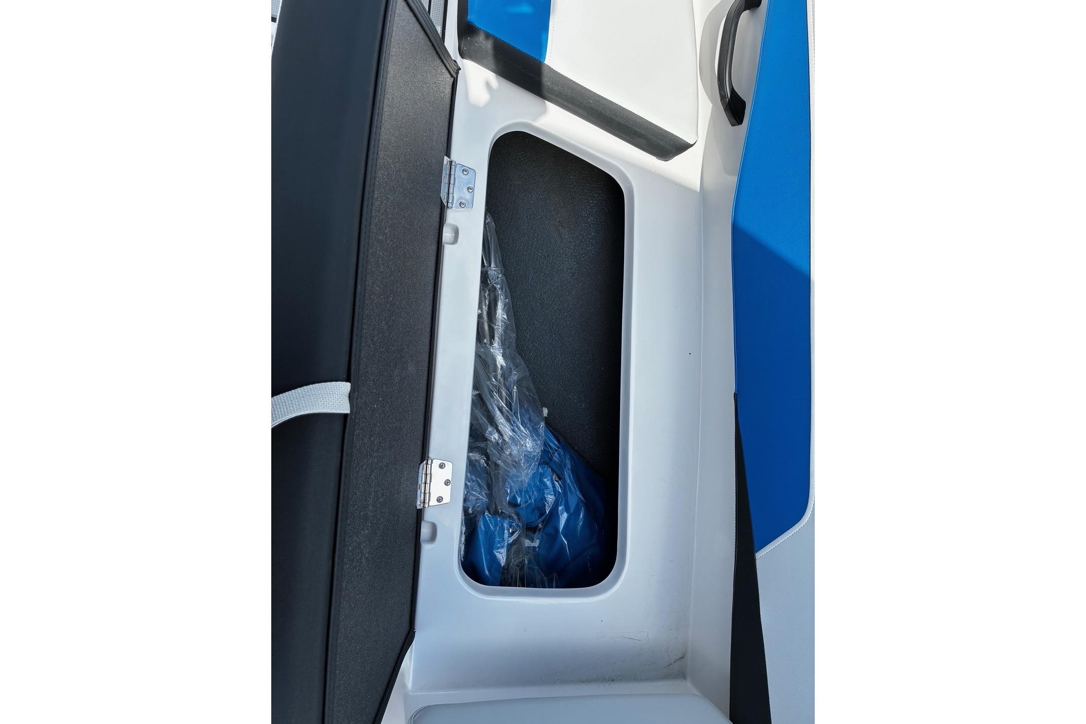 Storage compartment in 2026 Starcraft SV 16 OB boat, featuring sleek design and blue accents.