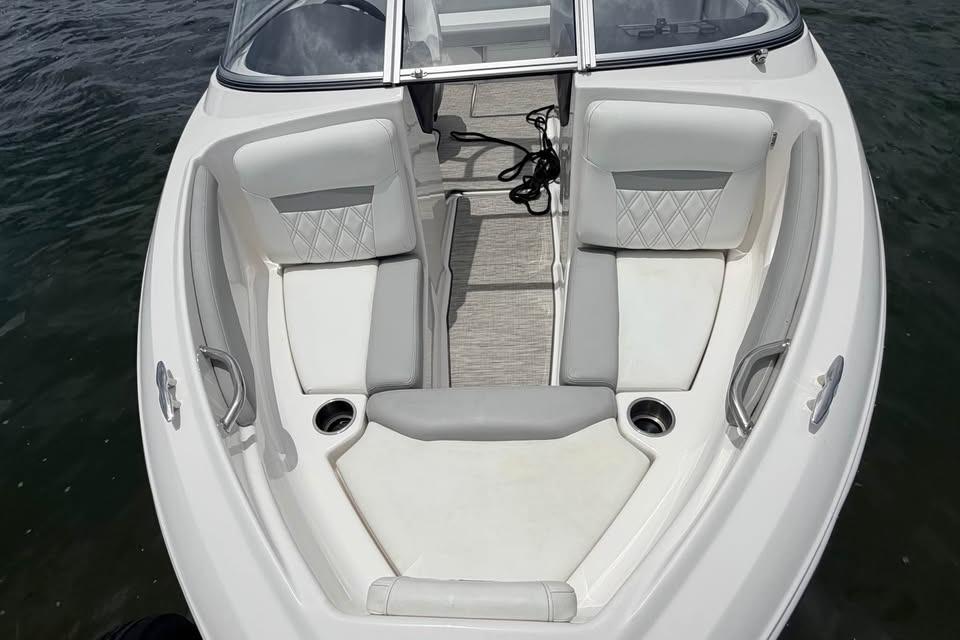 2019 Regal 1900 ES Bowrider boat interior with cushioned seating and cup holders.