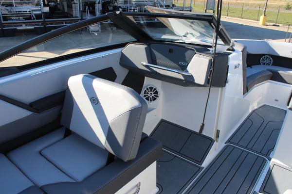 2025 Cobalt CS23 boat interior with modern seating and sleek dashboard design.