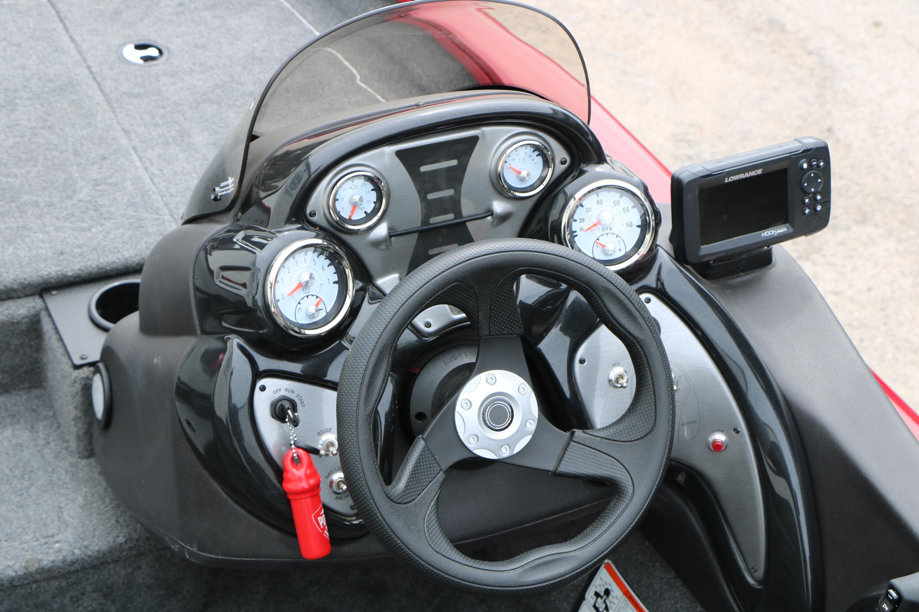 2024 Tracker Pro Team 175 dashboard with steering wheel and gauges.