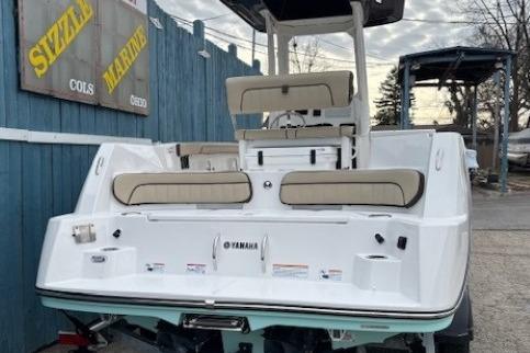 2026 Yamaha Boats 222 FSH Sport E, white exterior, docked at Sizzle Marine dealership.
