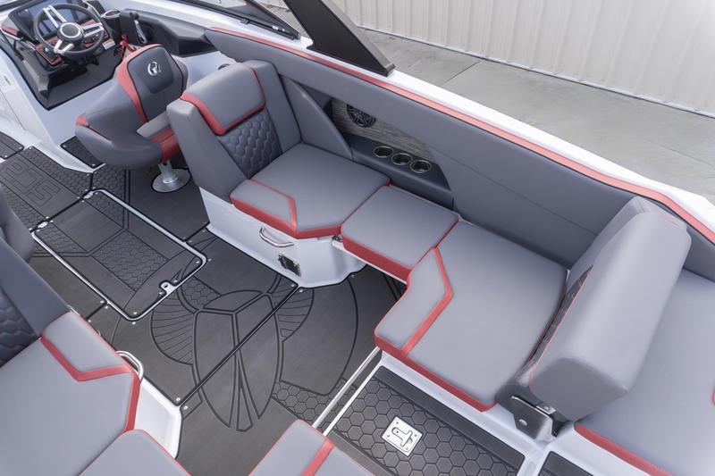 2026 Scarab 255 LX Wake boat interior with gray and red seating, modern design.