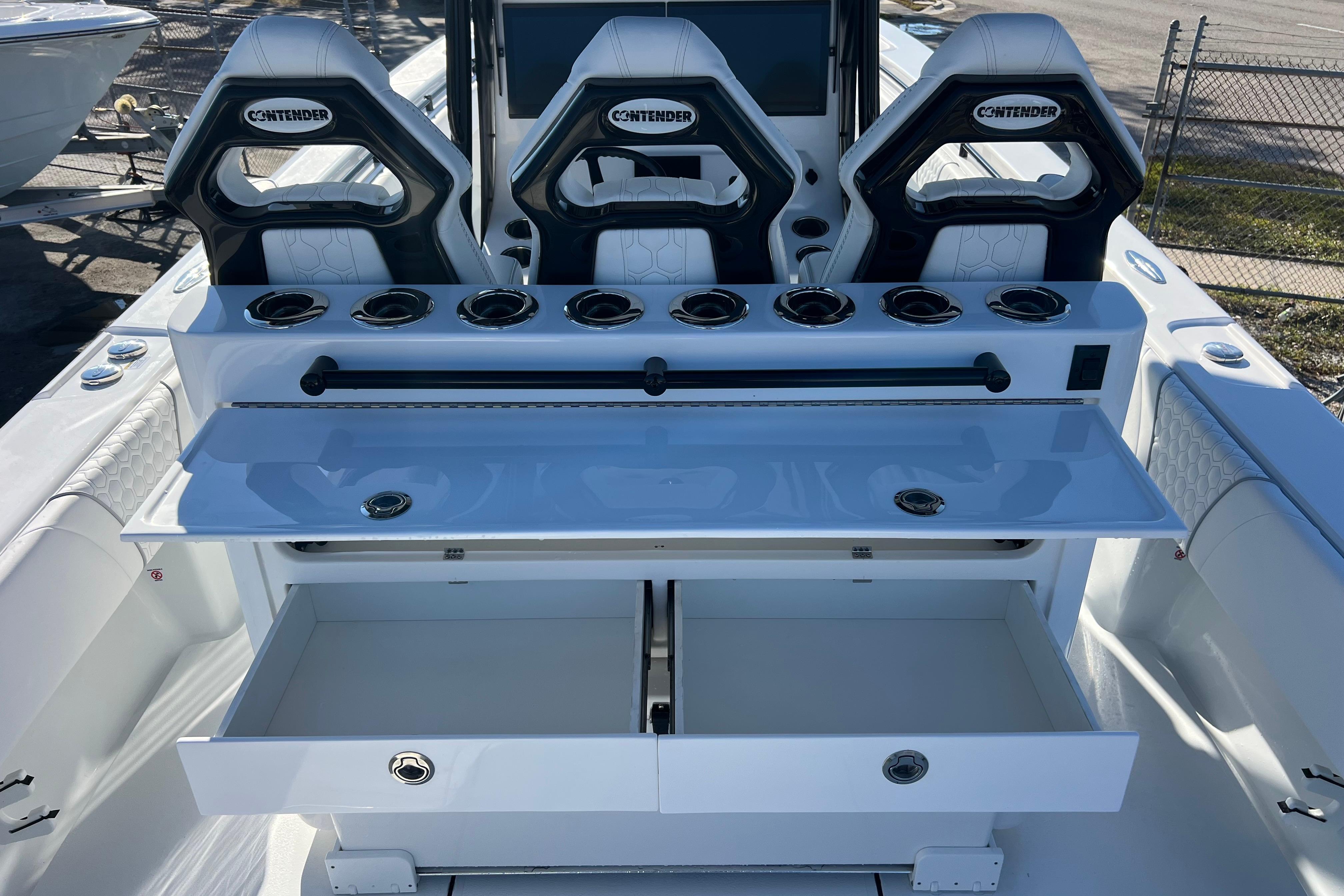 2026 Contender 35 ST boat interior with seating and storage compartments.