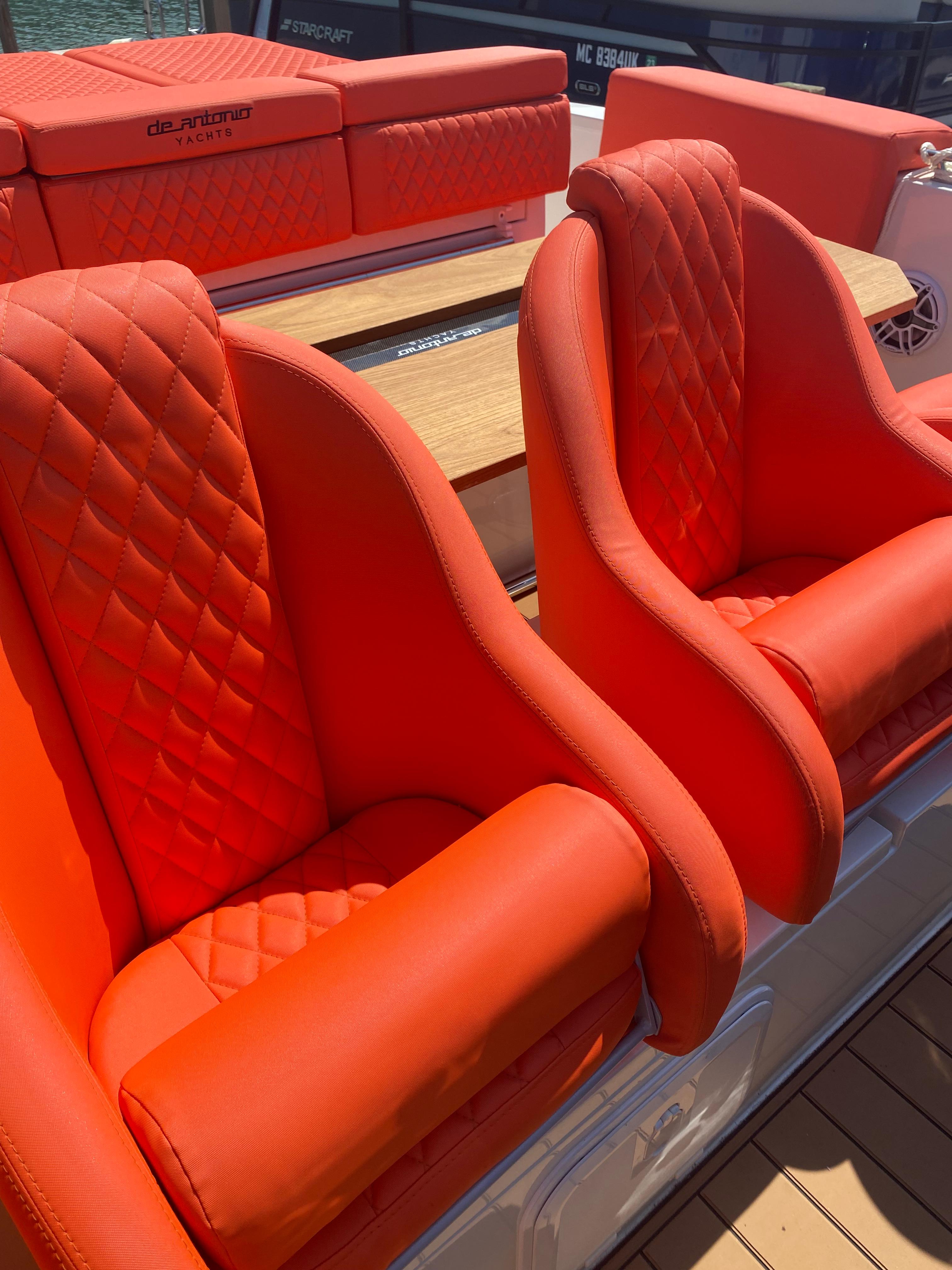 Bright orange seats on a 2020 De Antonio Yachts D 28 boat.