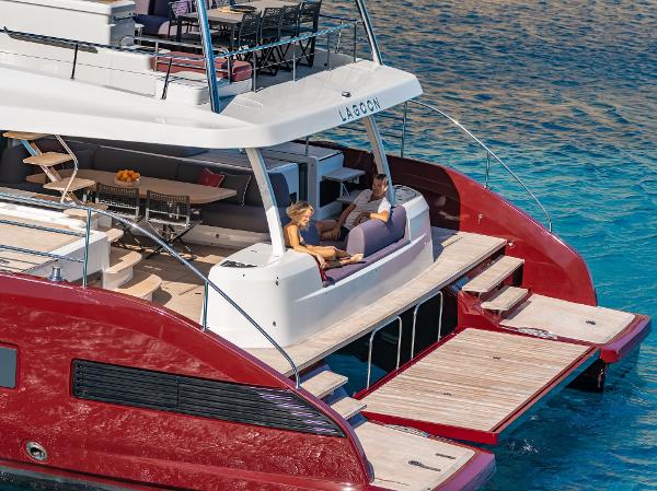 Luxury Lagoon SIXTY 7 yacht, 2025 model, with spacious deck and elegant design on clear blue water.