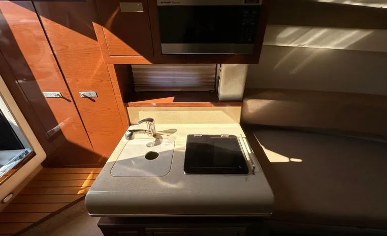 Interior of 2010 Sea Ray Sundancer 260 yacht kitchen.