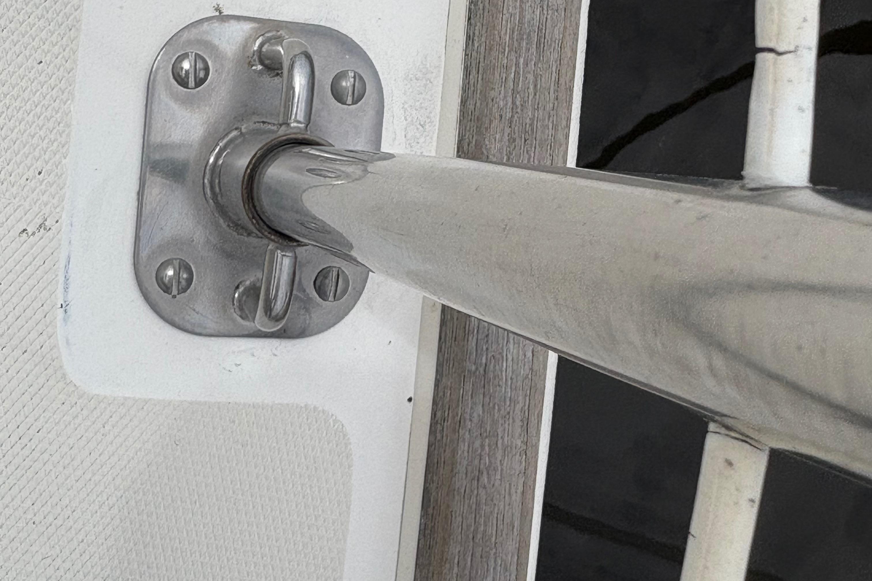 Stainless steel fitting on 1981 Sabre 31 sailboat deck.