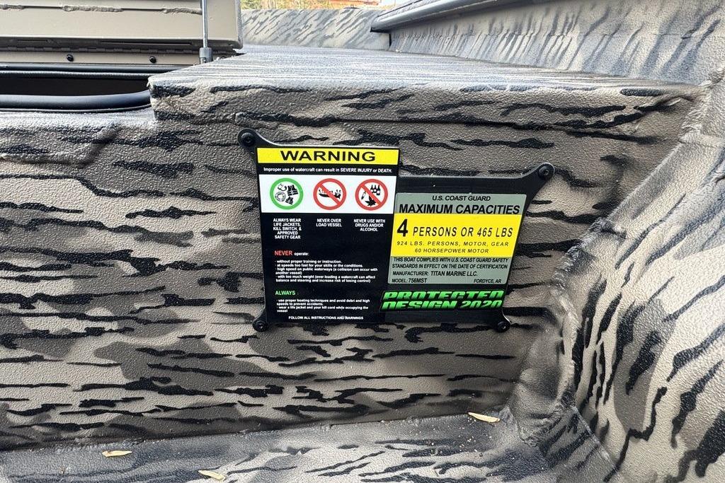 Warning label on 2026 Havoc 1756 boat, detailing maximum capacity and safety instructions.