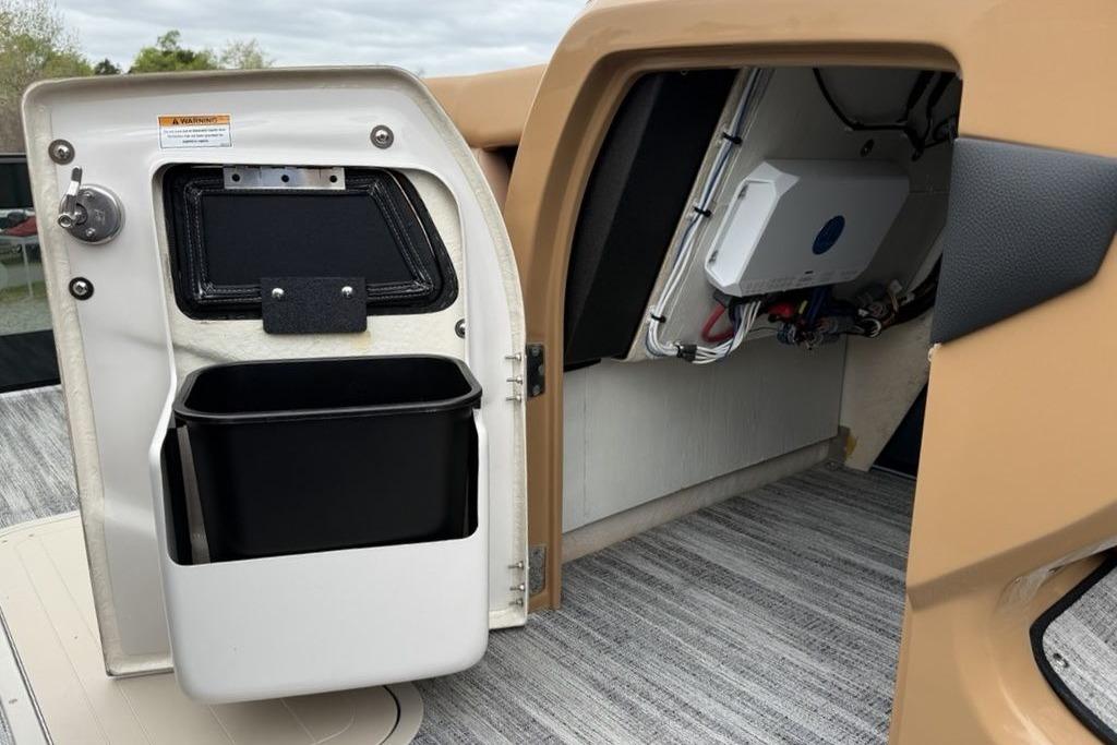 Interior storage compartment of 2026 Godfrey Monaco 235 SFLC iMPACT boat.
