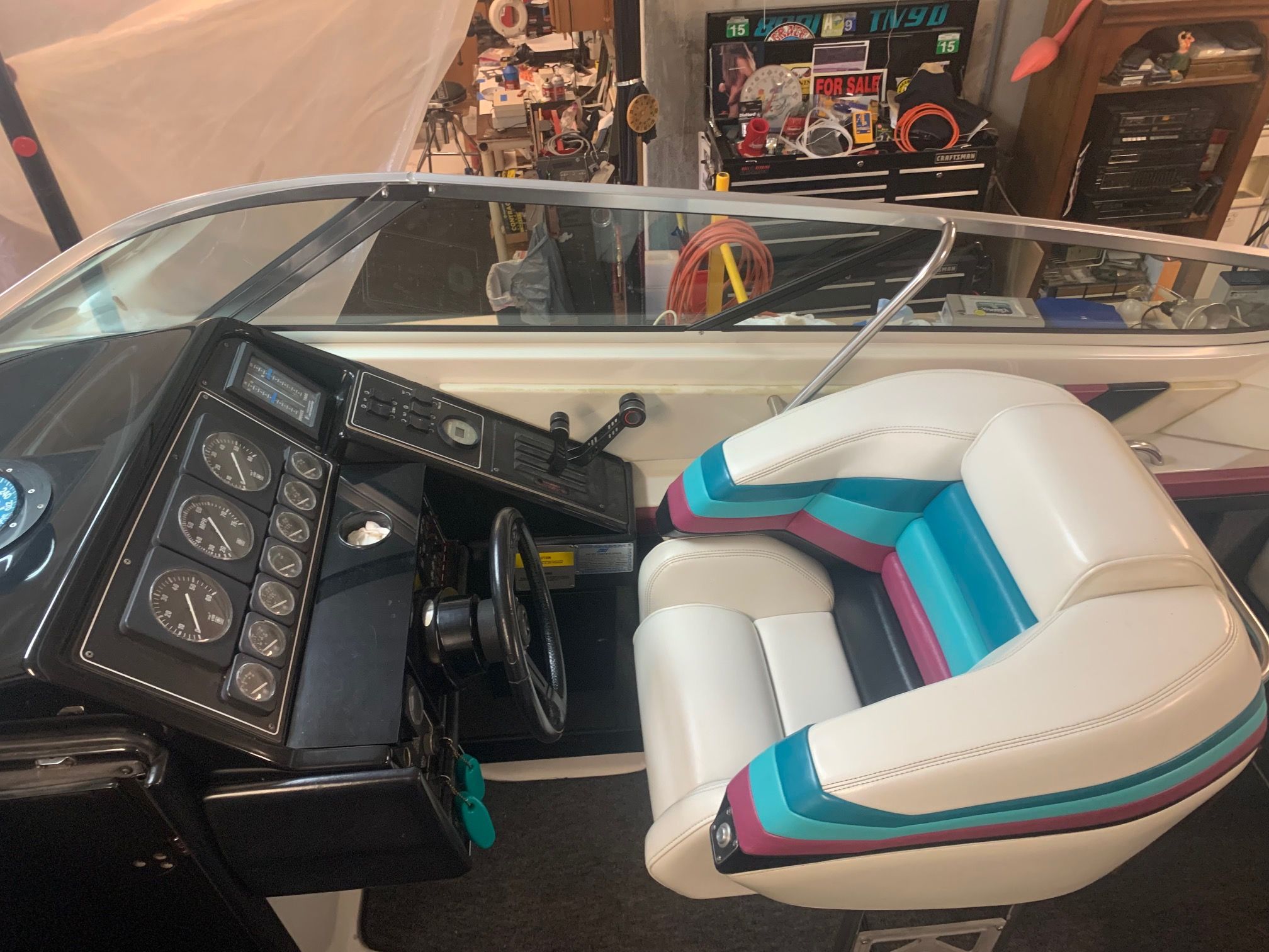 Interior view of a 1988 Formula 311 SR1 with colorful seat and dashboard.