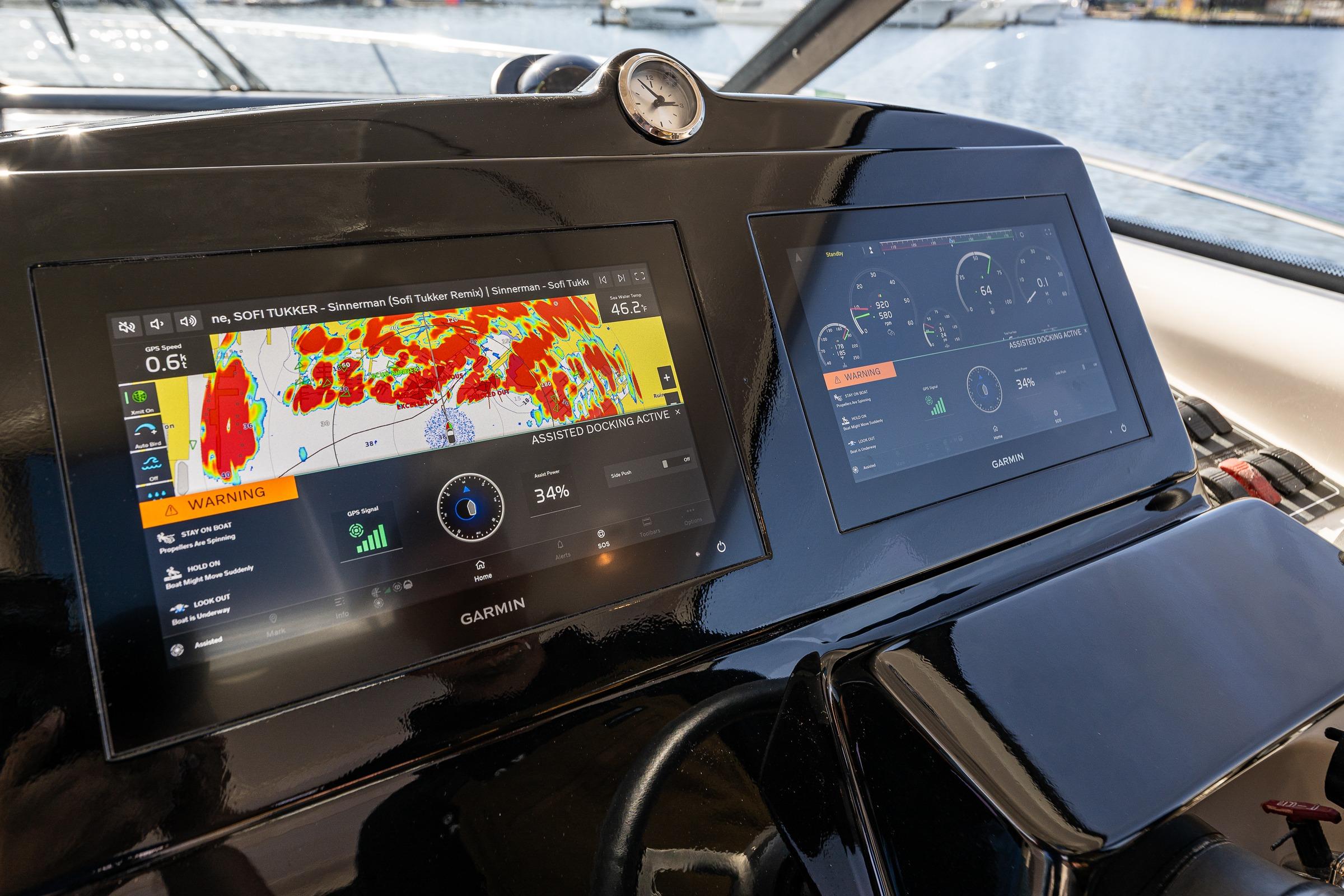 Garmin navigation screens on 2006 Tiara Yachts 4000 Sovran, displaying Radar and engine data data.