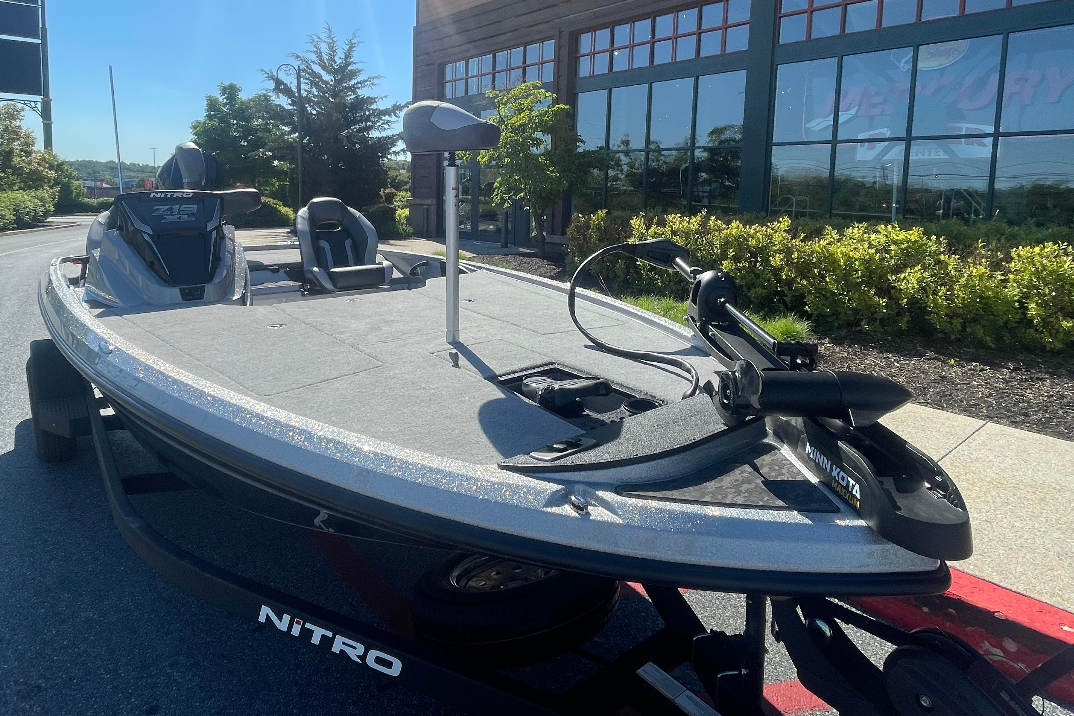 2026 Nitro Z19 XL boat with Minn Kota trolling motor, parked outdoors.
