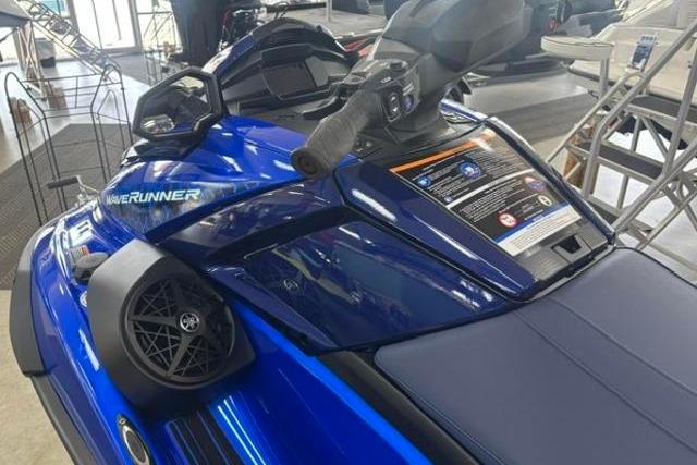 2026 Yamaha WaveRunner VX Limited in showroom, featuring sleek blue design and advanced controls.