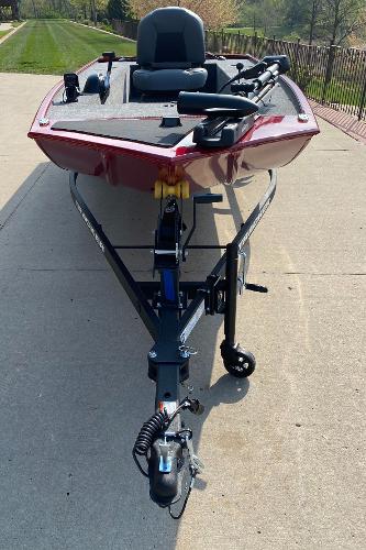 2025 Tracker Panfish 17 boat on trailer, parked on concrete driveway.