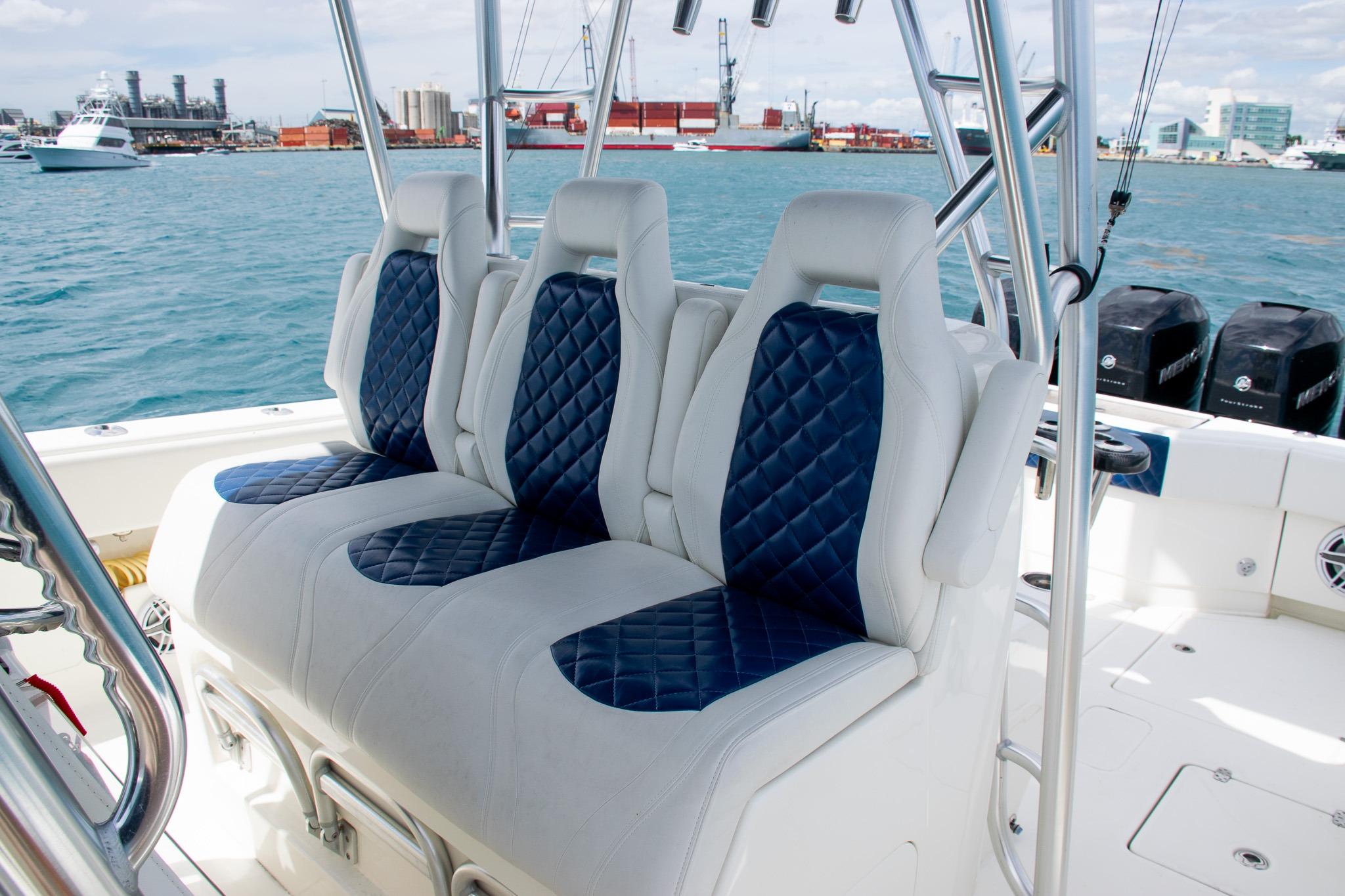 Luxury seating on 2022 SeaVee 390Z boat with blue and white upholstery.
