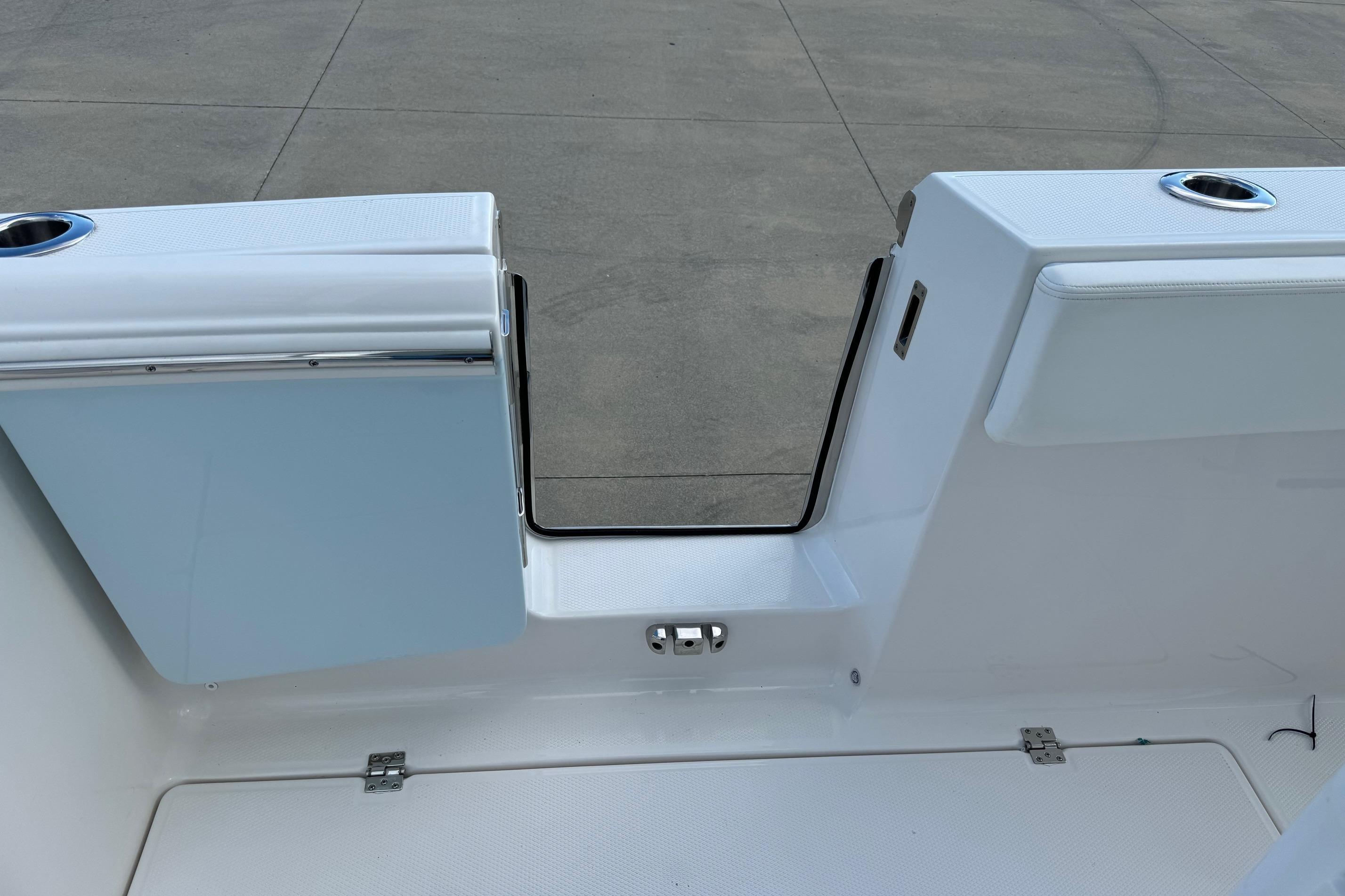 2025 Robalo R360 Center Console boat with open transom door.