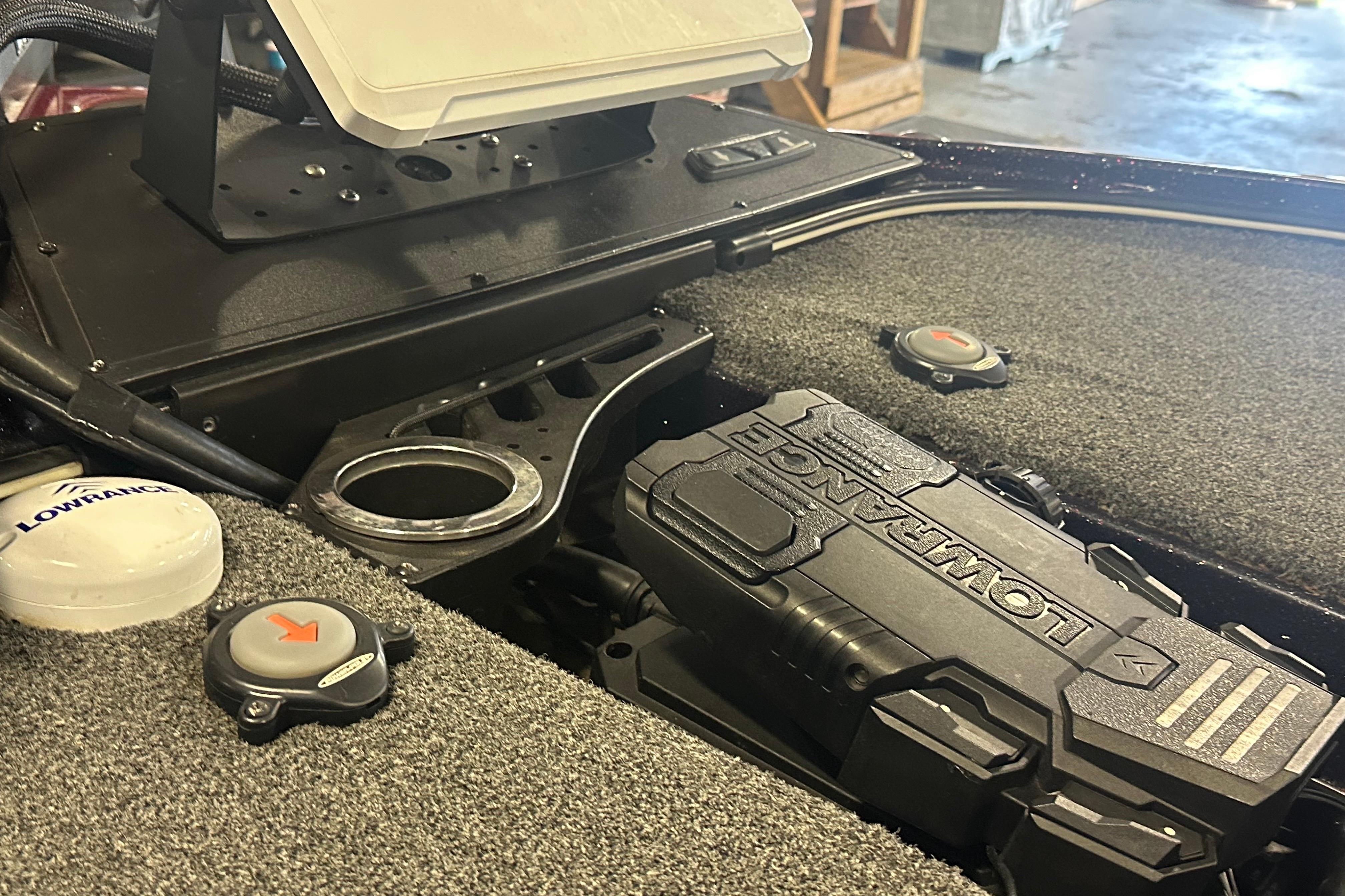 Interior of a 2022 Nitro Z20 Pro boat featuring Lowrance electronics and control panel.